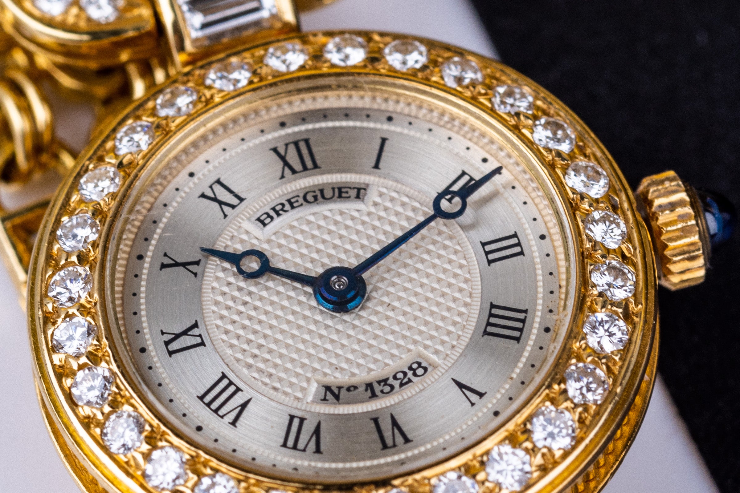 Breguet Ladies Wristwatch Circa 1990's | Silver Dial | Baguette Diamonds | 18k Yellow Gold | Diamond Bezel, Shoulders & Bracelet