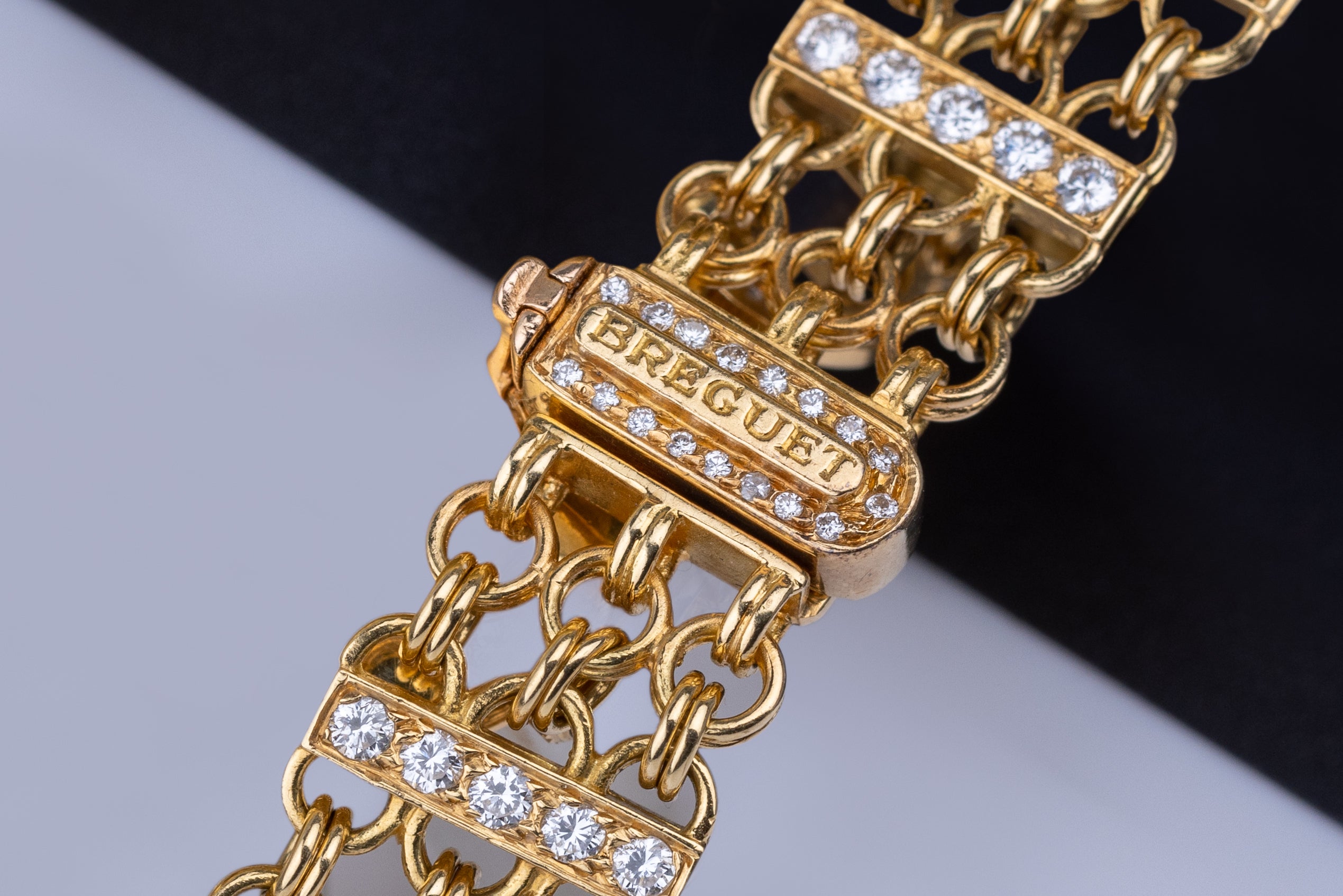 Breguet Ladies Wristwatch Circa 1990's | Silver Dial | Baguette Diamonds | 18k Yellow Gold | Diamond Bezel, Shoulders & Bracelet