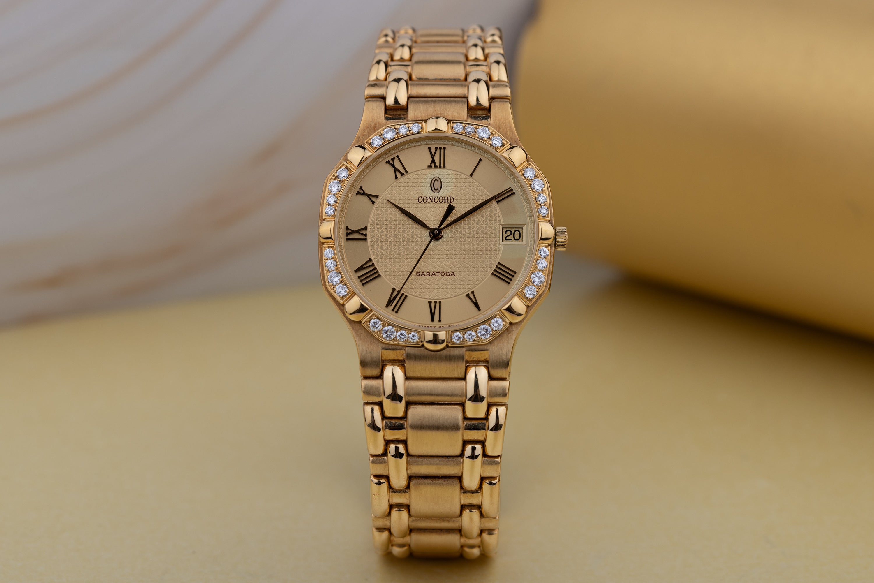 Concord Saratoga with Omani Khanjar Caseback | REF. 51 58 237/1 | Gold Dial & Diamond Bezel | 18k Yellow Gold | 1980s | Quartz | 31.5mm