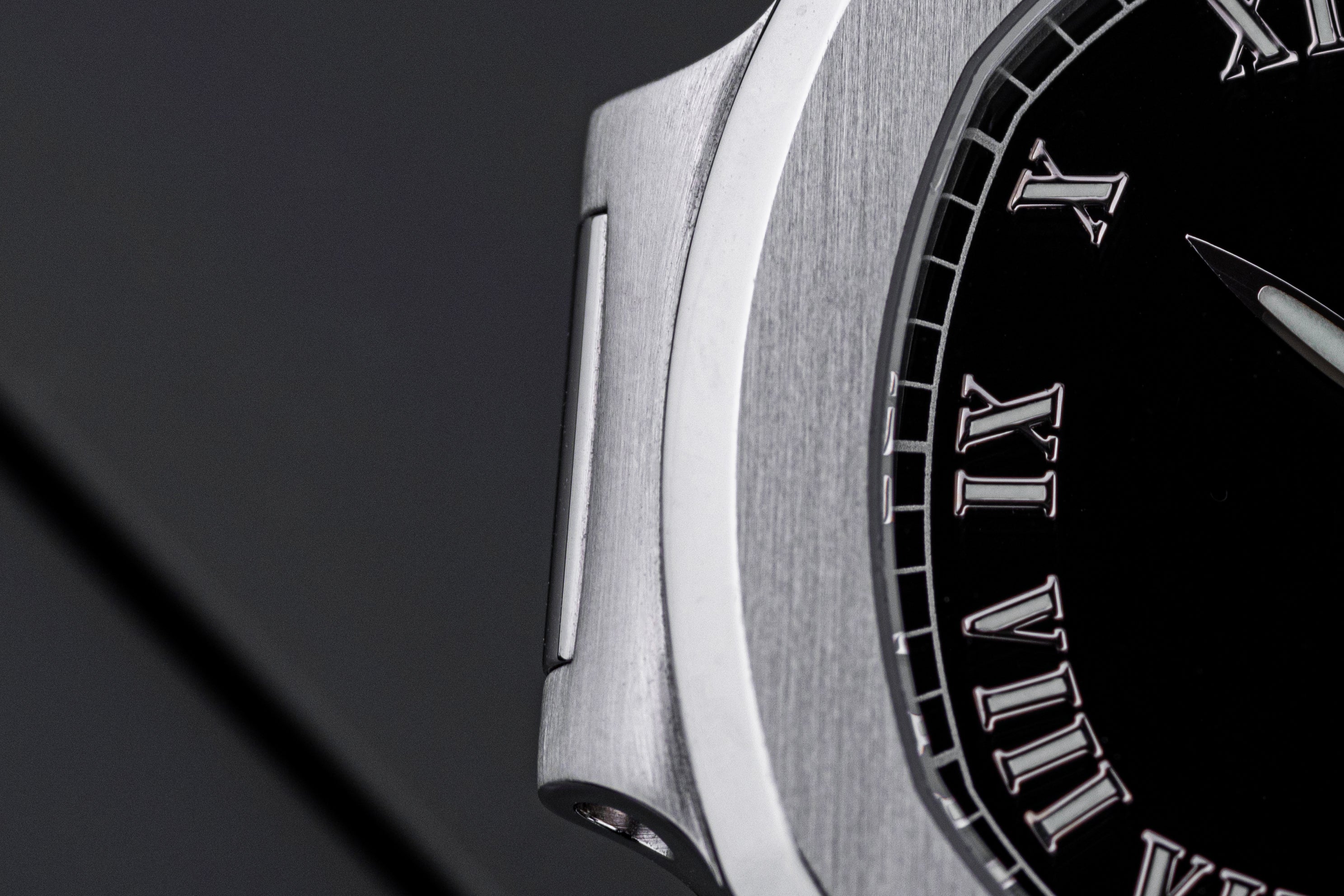 Patek Philippe Nautilus | REF. 3800/1A-001 | Black Roman Dial | 2005 | Stainless Steel | Box & Papers