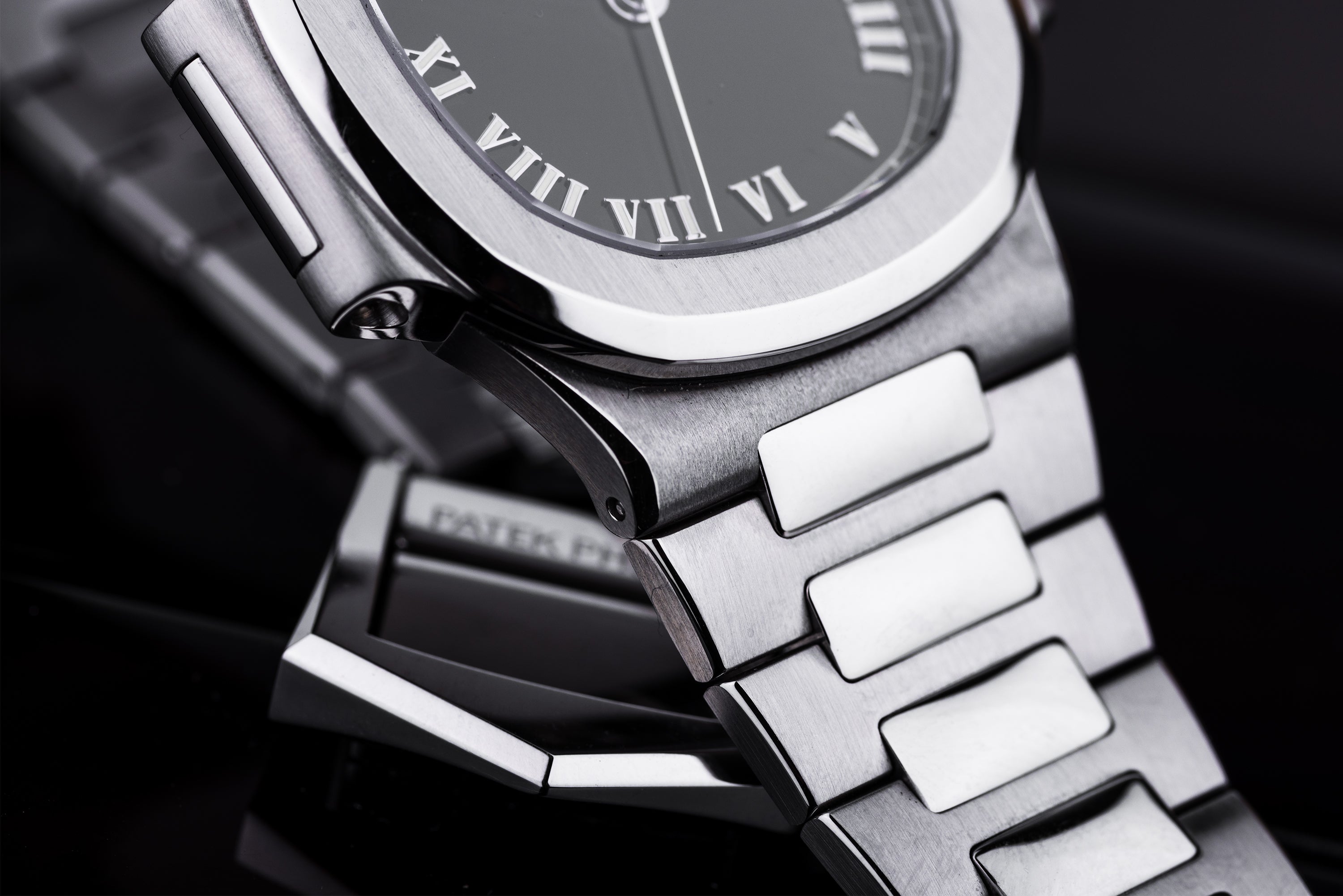 Patek Philippe Nautilus | REF. 3800/1A-001 | Black Roman Dial | 2005 | Stainless Steel | Box & Papers