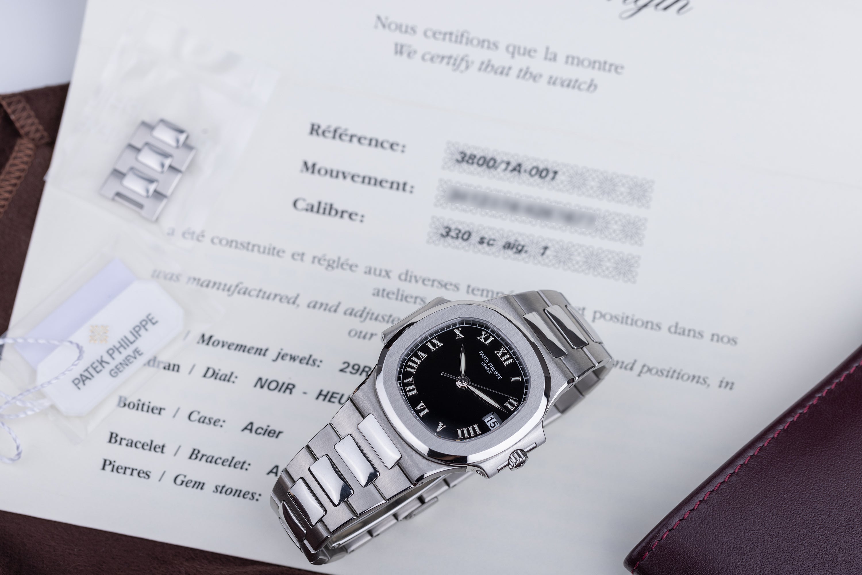 Patek Philippe Nautilus | REF. 3800/1A-001 | Black Roman Dial | 2005 | Stainless Steel | Box & Papers