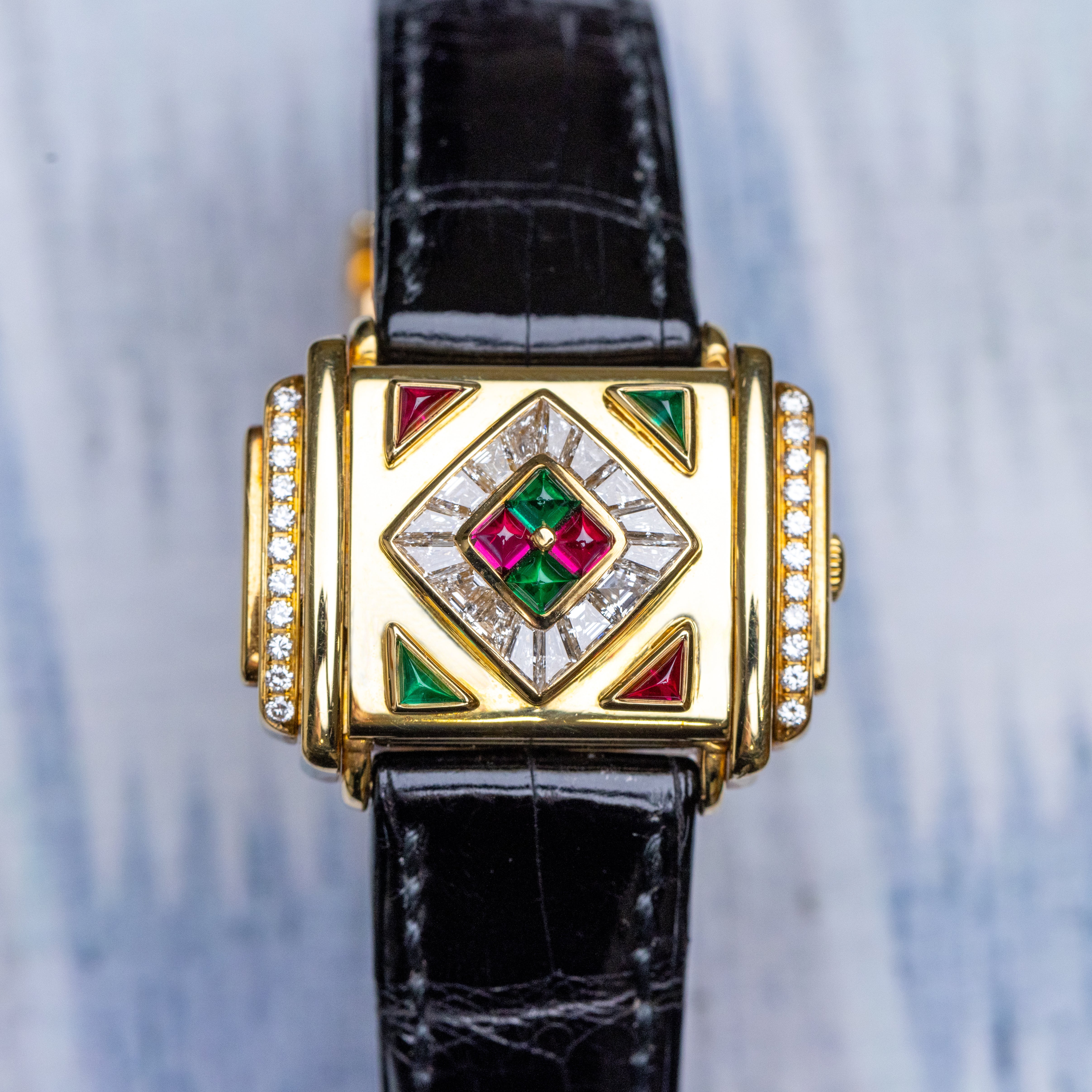 Rare Piaget Secret | REF. 16988 | Ruby, Emerald & 'Cut to Measure' Diamonds | 29mm | 18k Yellow Gold
