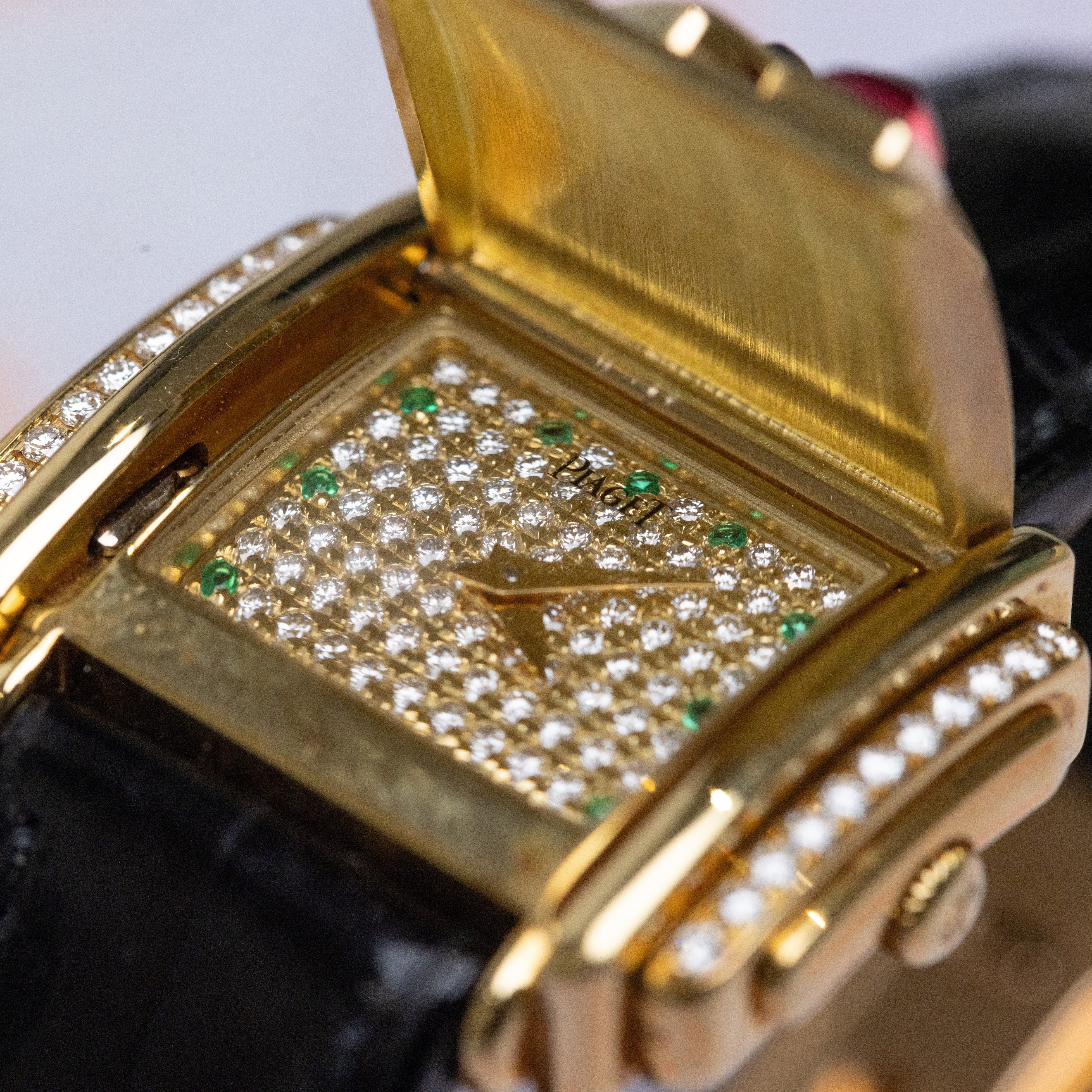 Rare Piaget Secret | REF. 16988 | Ruby, Emerald & 'Cut to Measure' Diamonds | 29mm | 18k Yellow Gold