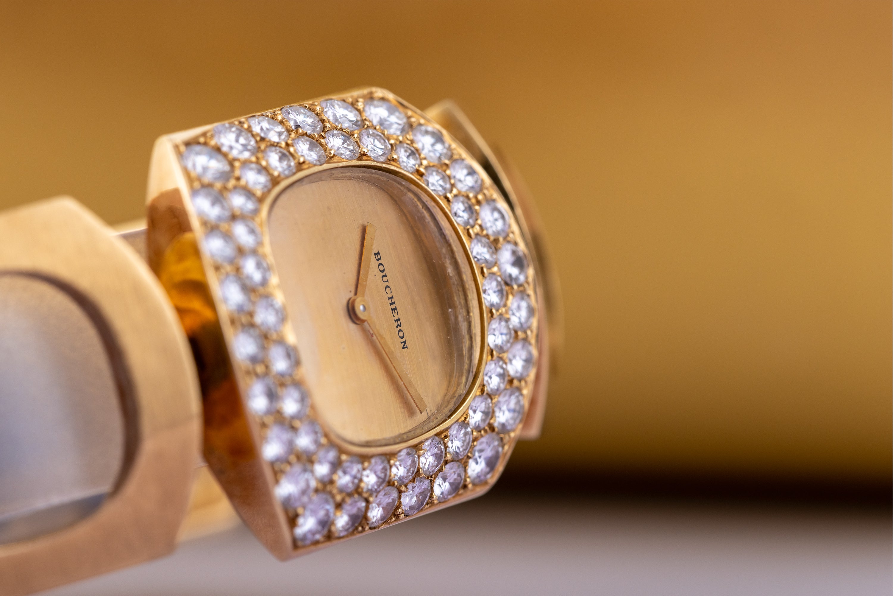 Boucheron Vintage Lady's Wristwatch | Circa 1970s | Champagne Dial | Double Row Diamond Bezel | 18k Yellow Gold