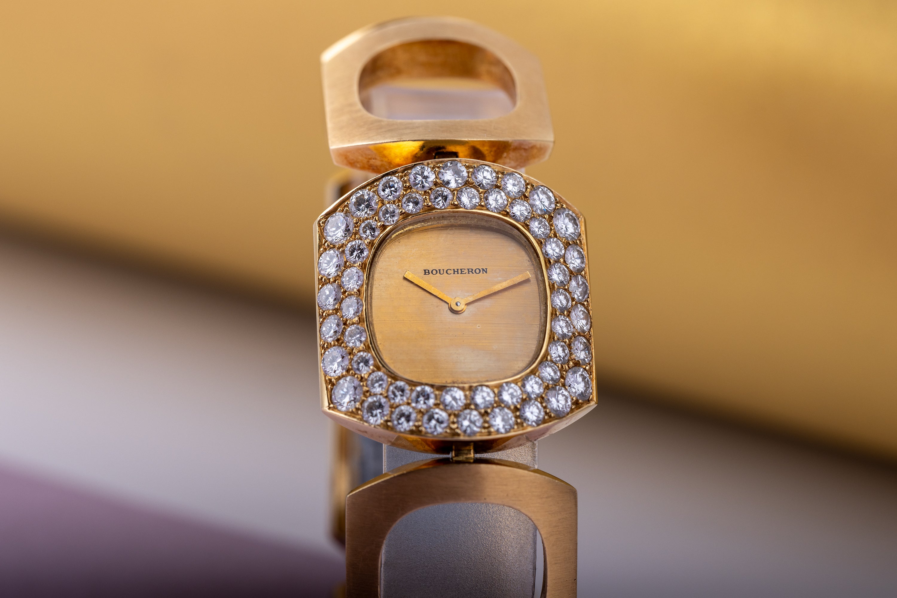 Boucheron Vintage Lady's Wristwatch | Circa 1970s | Champagne Dial | Double Row Diamond Bezel | 18k Yellow Gold