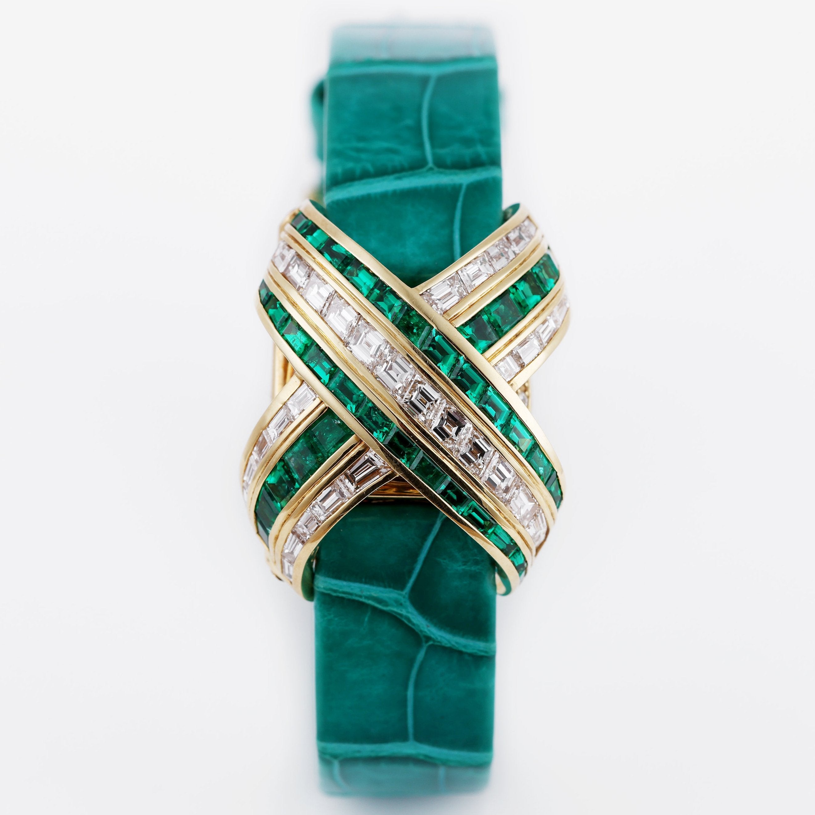 Audemars Piguet Ladies Wristwatch | REF. 67057/BA/E/0132 / 01 | Pave Diamond Dial, Emerald Hours | Emerald & Diamond 'X' Case | 18k Yellow Gold | Circa 1990's