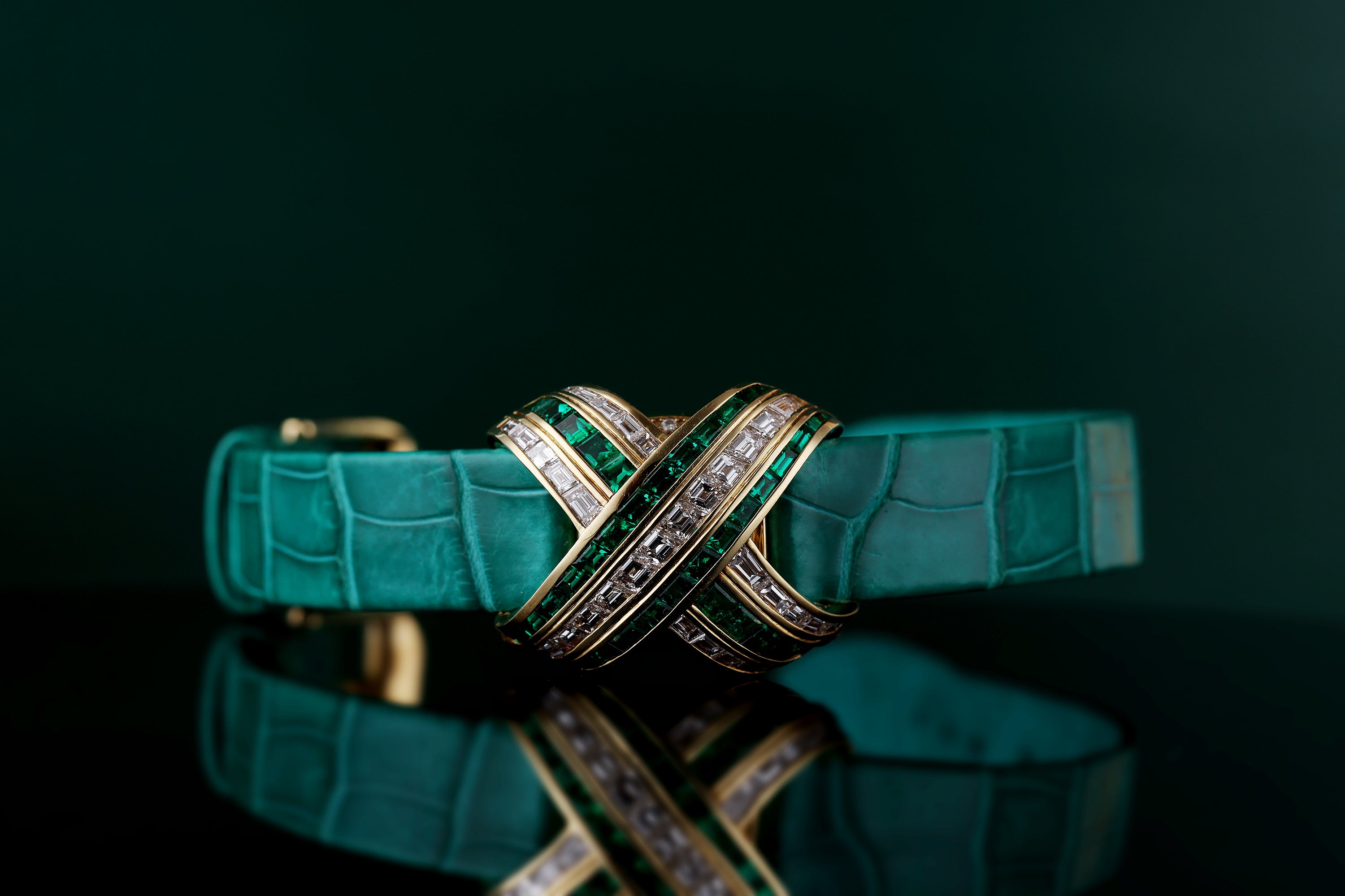 Audemars Piguet Ladies Wristwatch | REF. 67057/BA/E/0132 / 01 | Pave Diamond Dial, Emerald Hours | Emerald & Diamond 'X' Case | 18k Yellow Gold | Circa 1990's