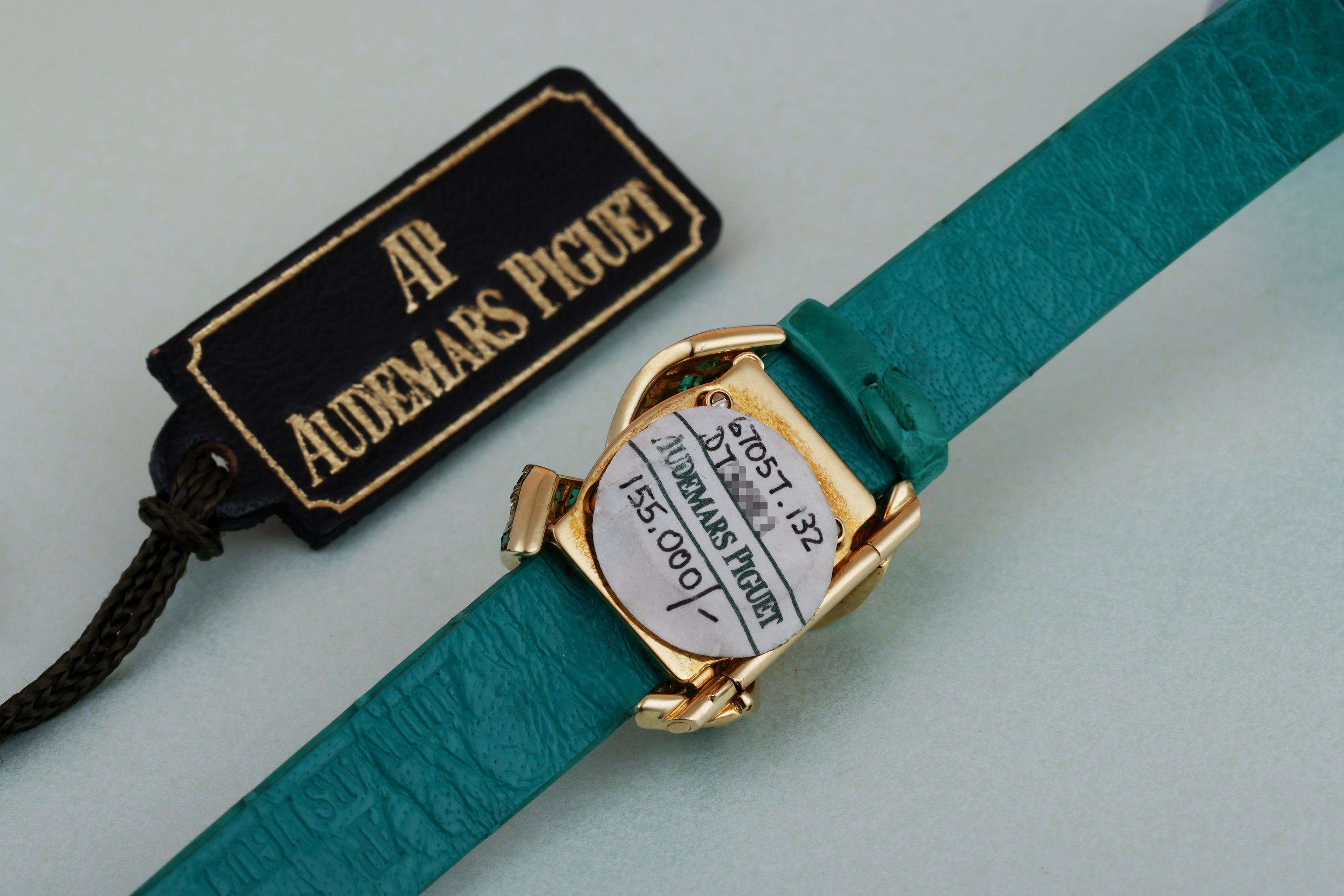 Audemars Piguet Ladies Wristwatch | REF. 67057/BA/E/0132 / 01 | Pave Diamond Dial, Emerald Hours | Emerald & Diamond 'X' Case | 18k Yellow Gold | Circa 1990's