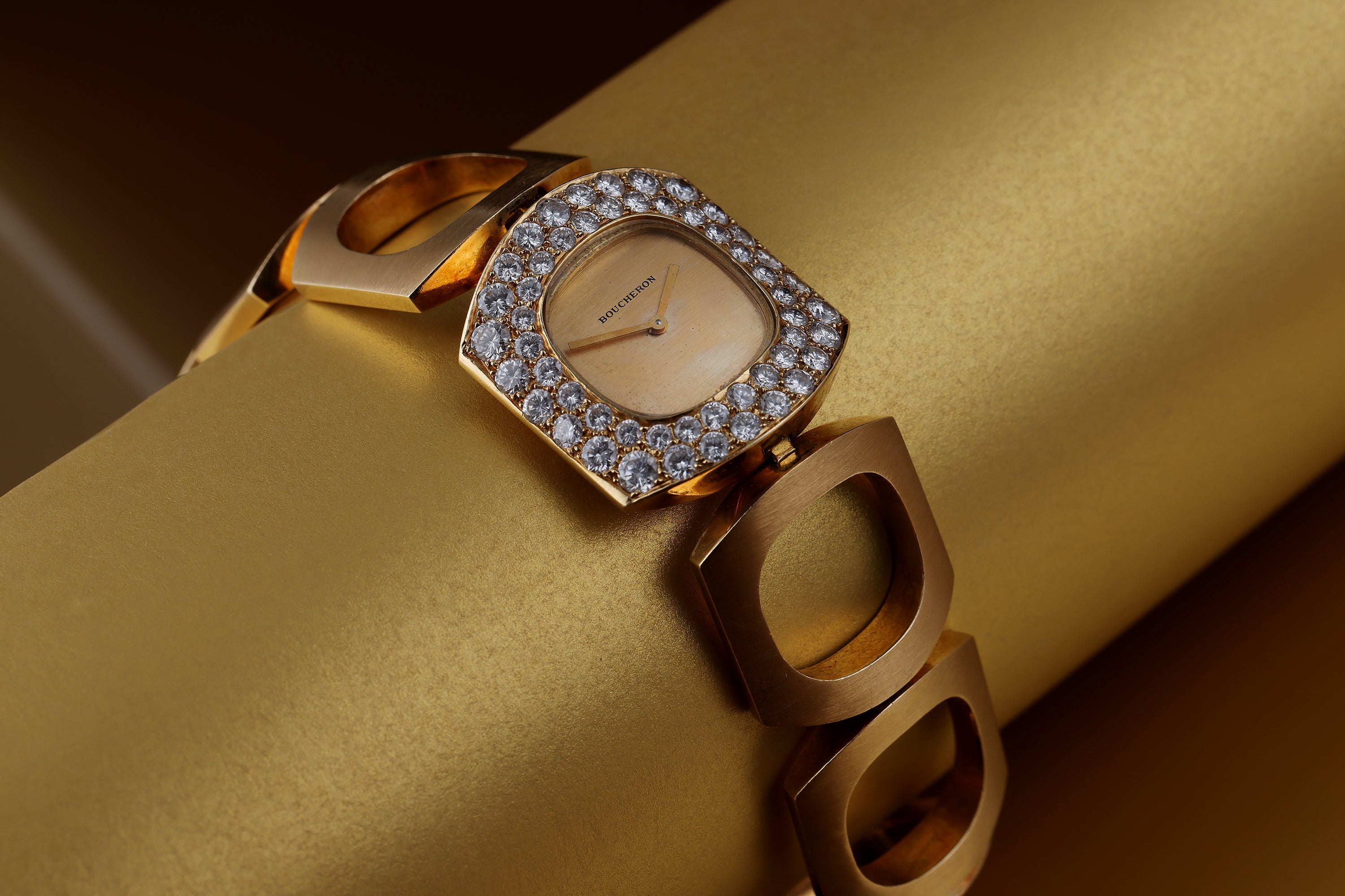 Boucheron Vintage Lady's Wristwatch | Circa 1970s | Champagne Dial | Double Row Diamond Bezel | 18k Yellow Gold