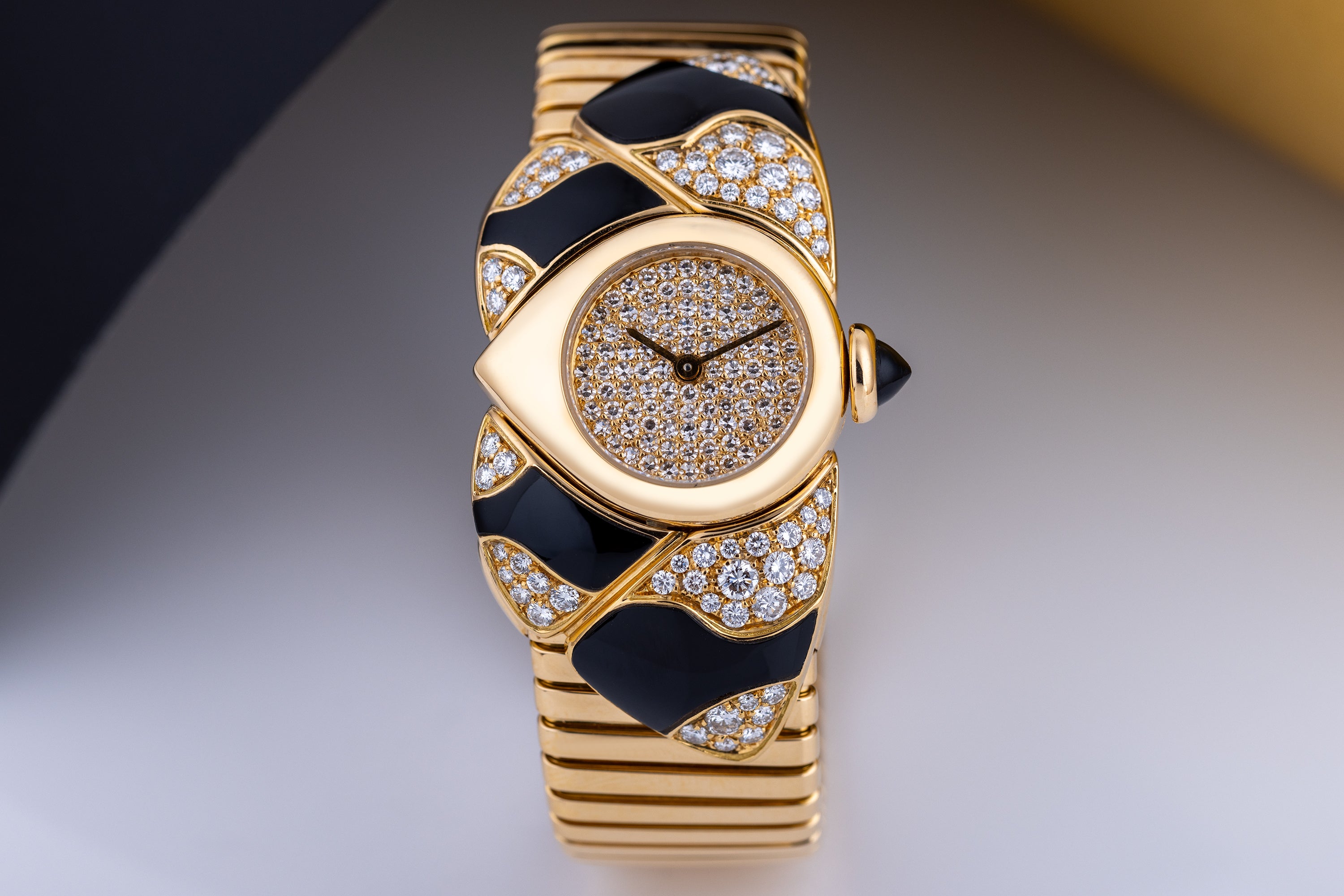 Unworn Vintage Bvlgari Farfalla Watch Bangle | REF. BJ 04 | Pave Diamond Dial | Onyx & Diamond Shoulders | 18k Yellow Gold | Circa 1990's