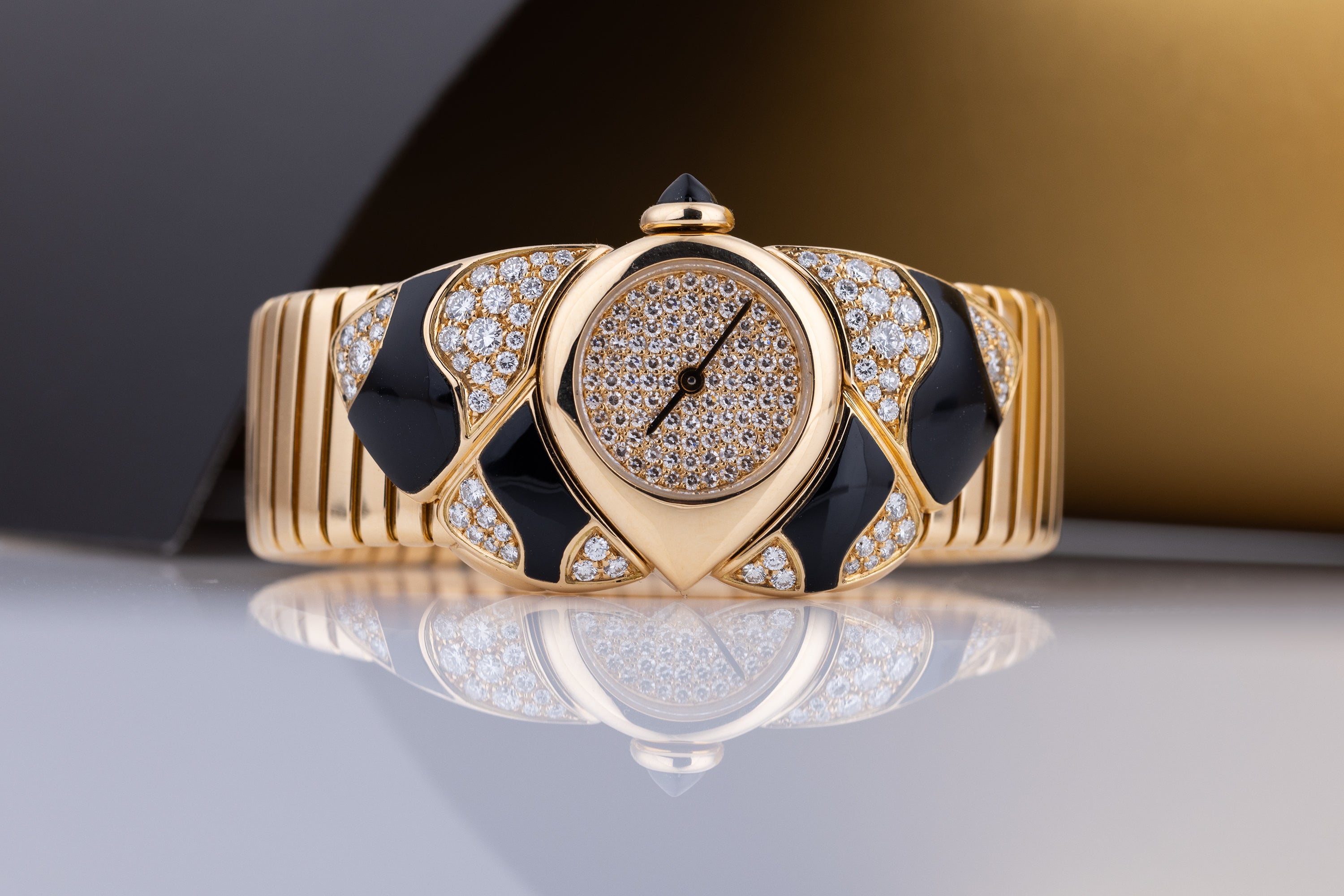 Unworn Vintage Bvlgari Farfalla Watch Bangle | REF. BJ 04 | Pave Diamond Dial | Onyx & Diamond Shoulders | 18k Yellow Gold | Circa 1990's