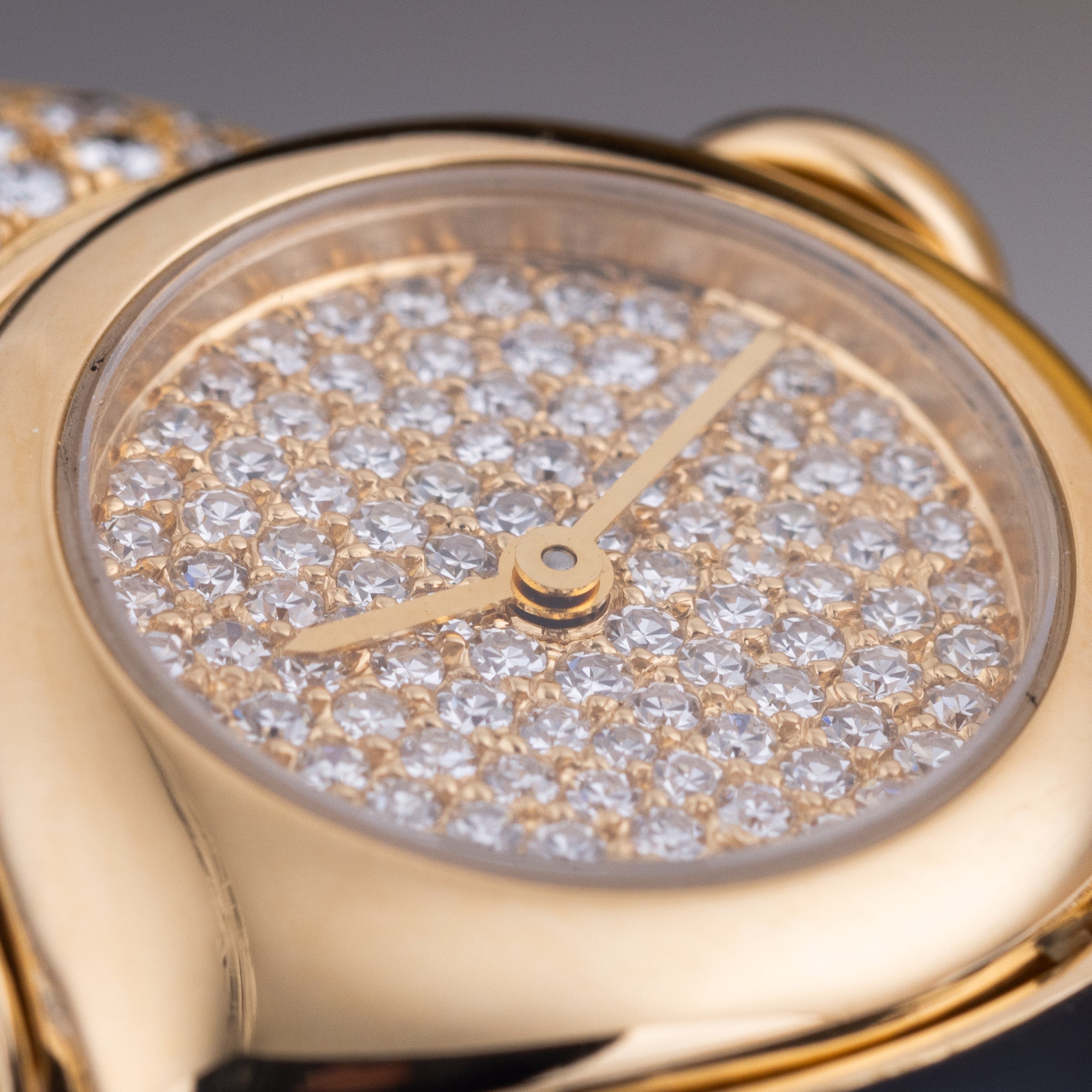 Unworn Vintage Bvlgari Farfalla Watch Bangle | REF. BJ 04 | Pave Diamond Dial | Onyx & Diamond Shoulders | 18k Yellow Gold | Circa 1990's