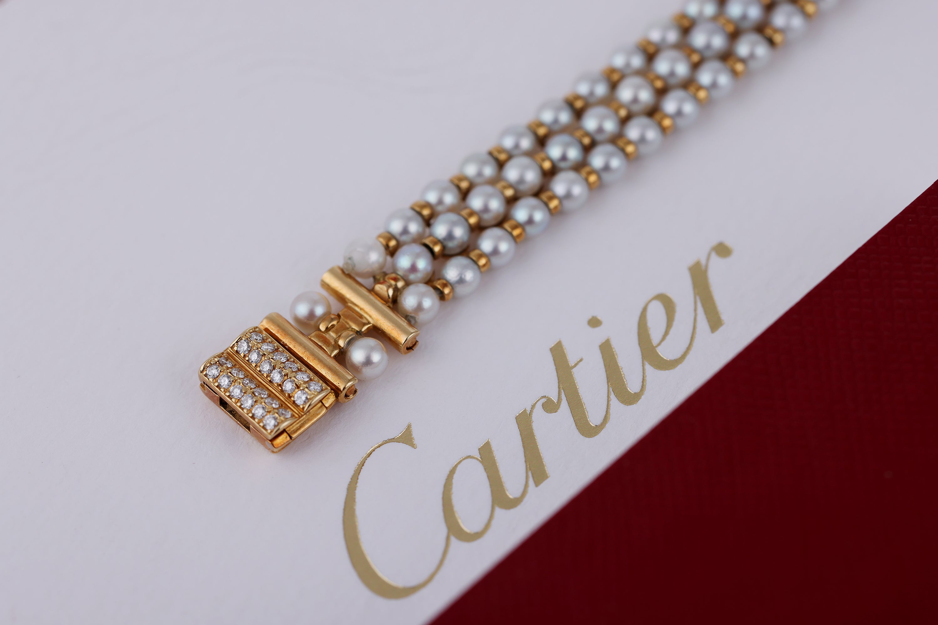 Rare Cartier Pearl Mini Tank Quartz | REF. 828006 | 14mm | Pearl Integrated Bracelet | Ruby & Diamonds | 18k Yellow Gold