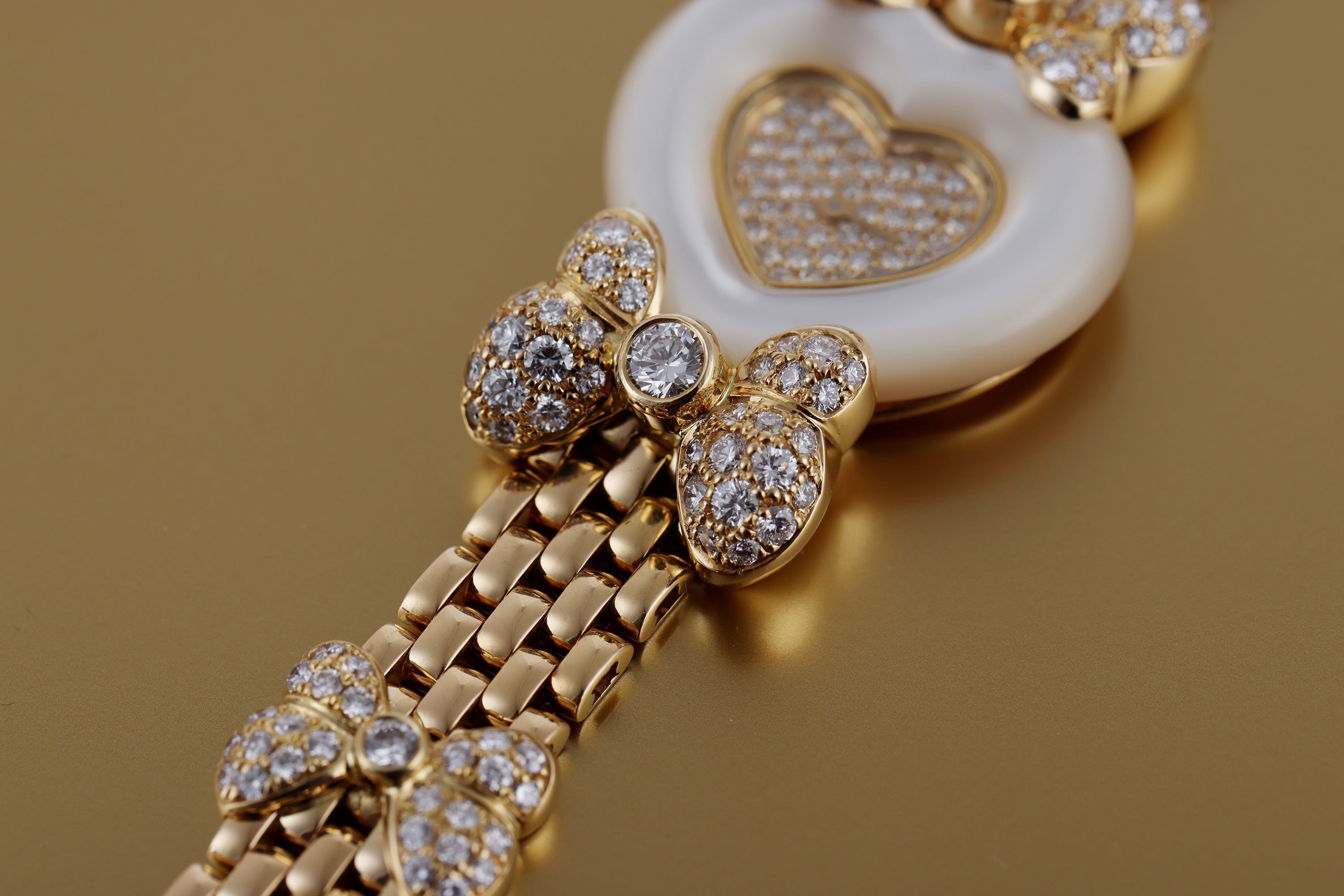 Chopard Ladies Watch | Heart-Shaped Mother of Pearl Bezel | REF. 538 1 | Pave Diamond Dial & Bow Bracelet | 18k Yellow Gold | 25mm | 1990's