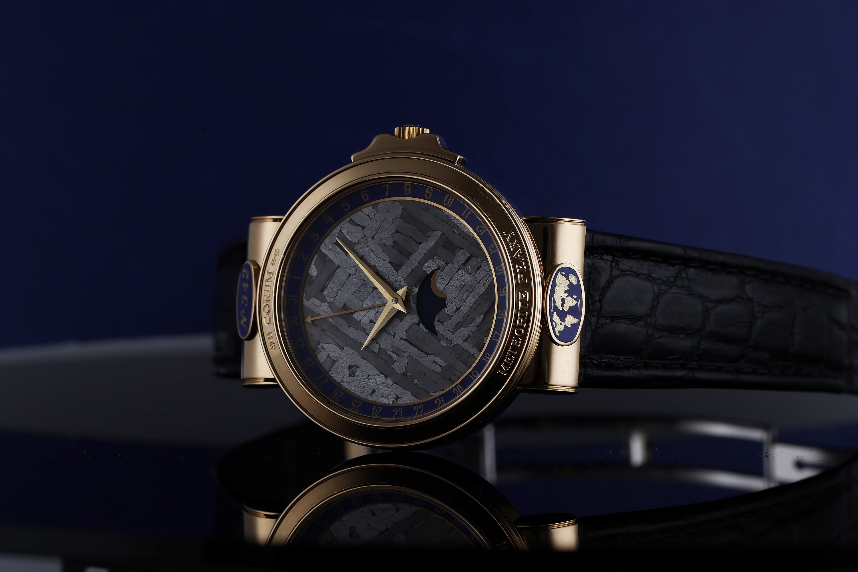 Corum 'Meteorite Peary' | REF. 81.450.56 | Moonphase & Date Display | Meteorite Dial | Blue Enamel | 18k Yellow Gold | Circa 1990's