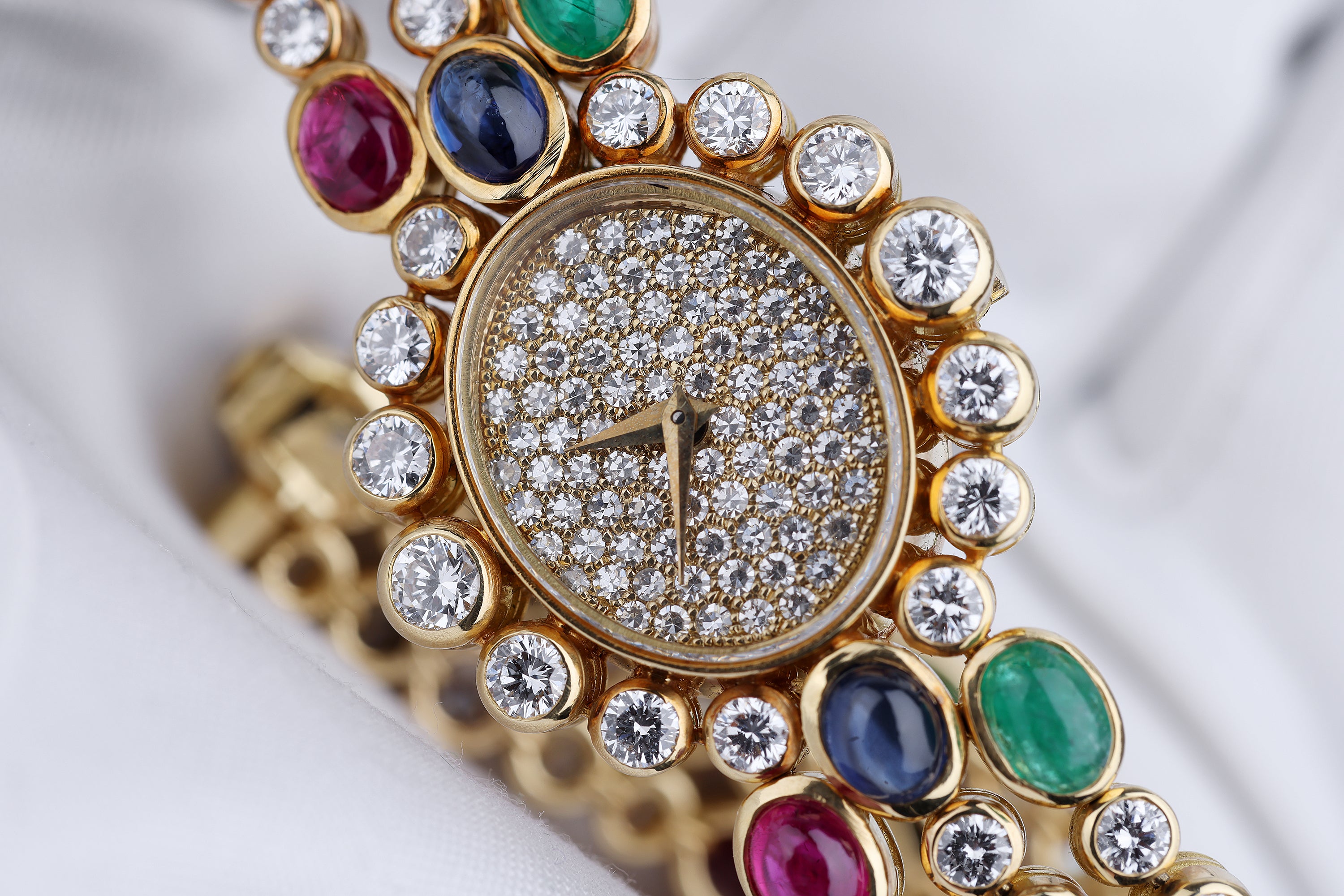 DeLaneau 1990's Ladies Wristwatch | Pavé Diamonds & Multi Gemstones | Ruby, Emerald & Sapphire Cabochons | 18k Yellow Gold