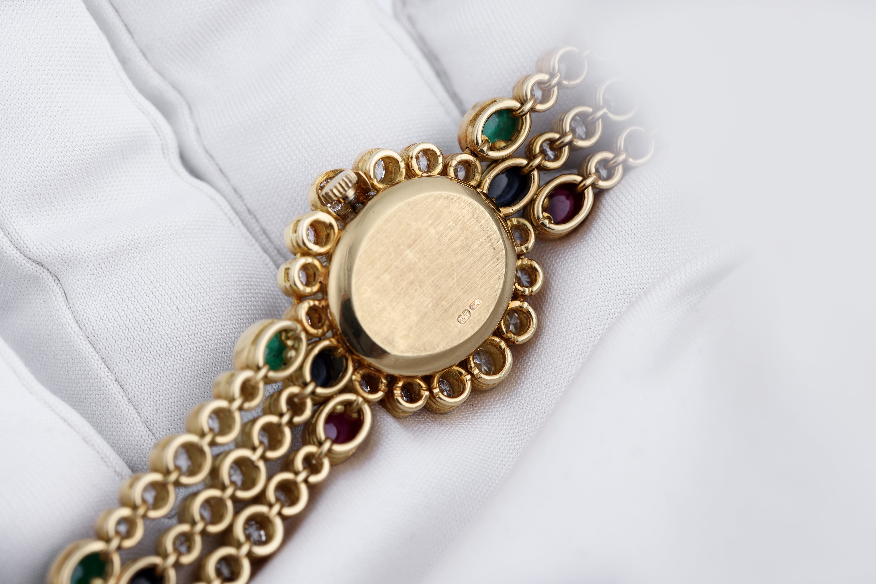 DeLaneau 1990's Ladies Wristwatch | Pavé Diamonds & Multi Gemstones | Ruby, Emerald & Sapphire Cabochons | 18k Yellow Gold