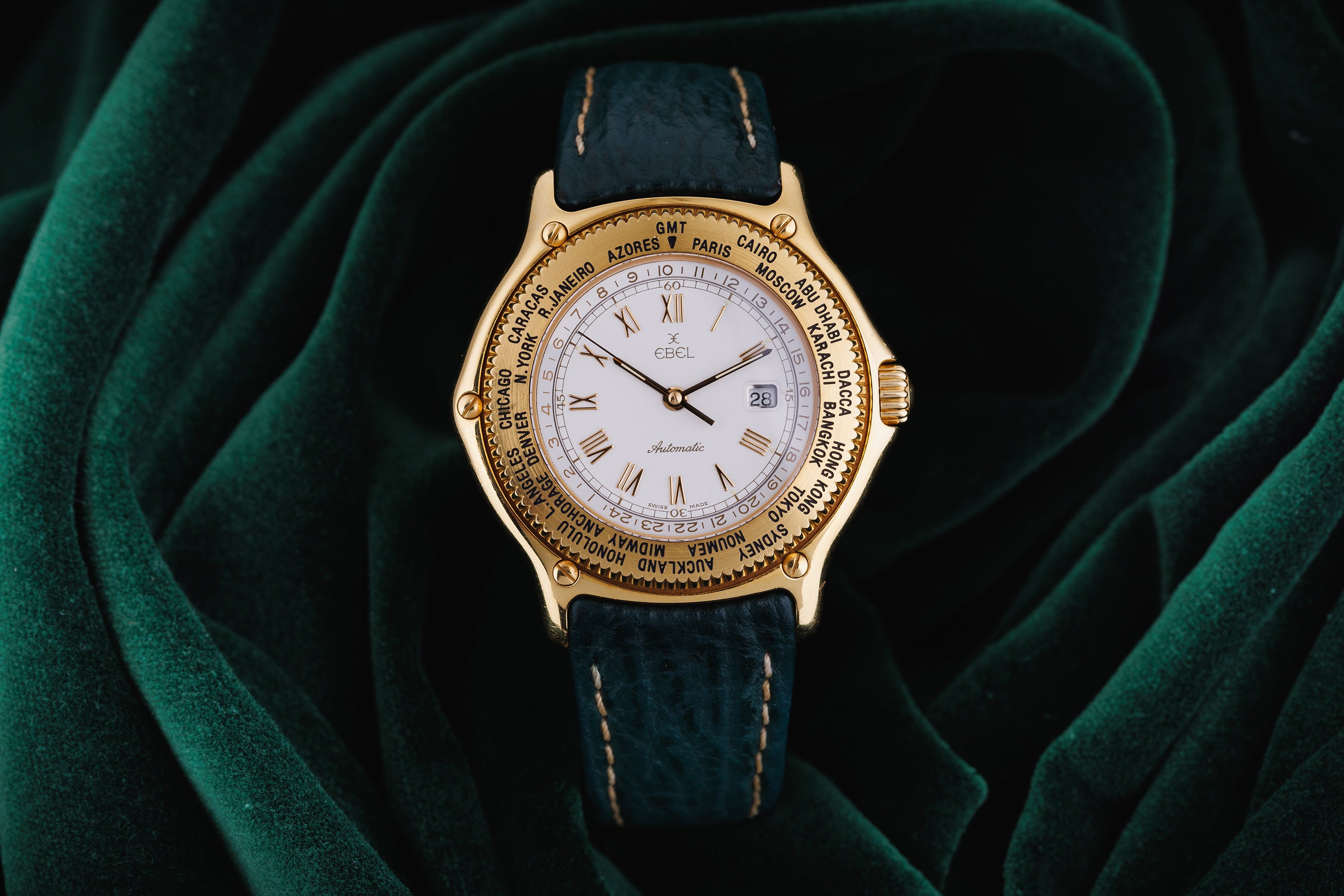 New Old Stock: Ebel Voyager World Time | REF. 8124913 | White Dial | Automatic | 18k Yellow Gold | 38mm | 1990's
