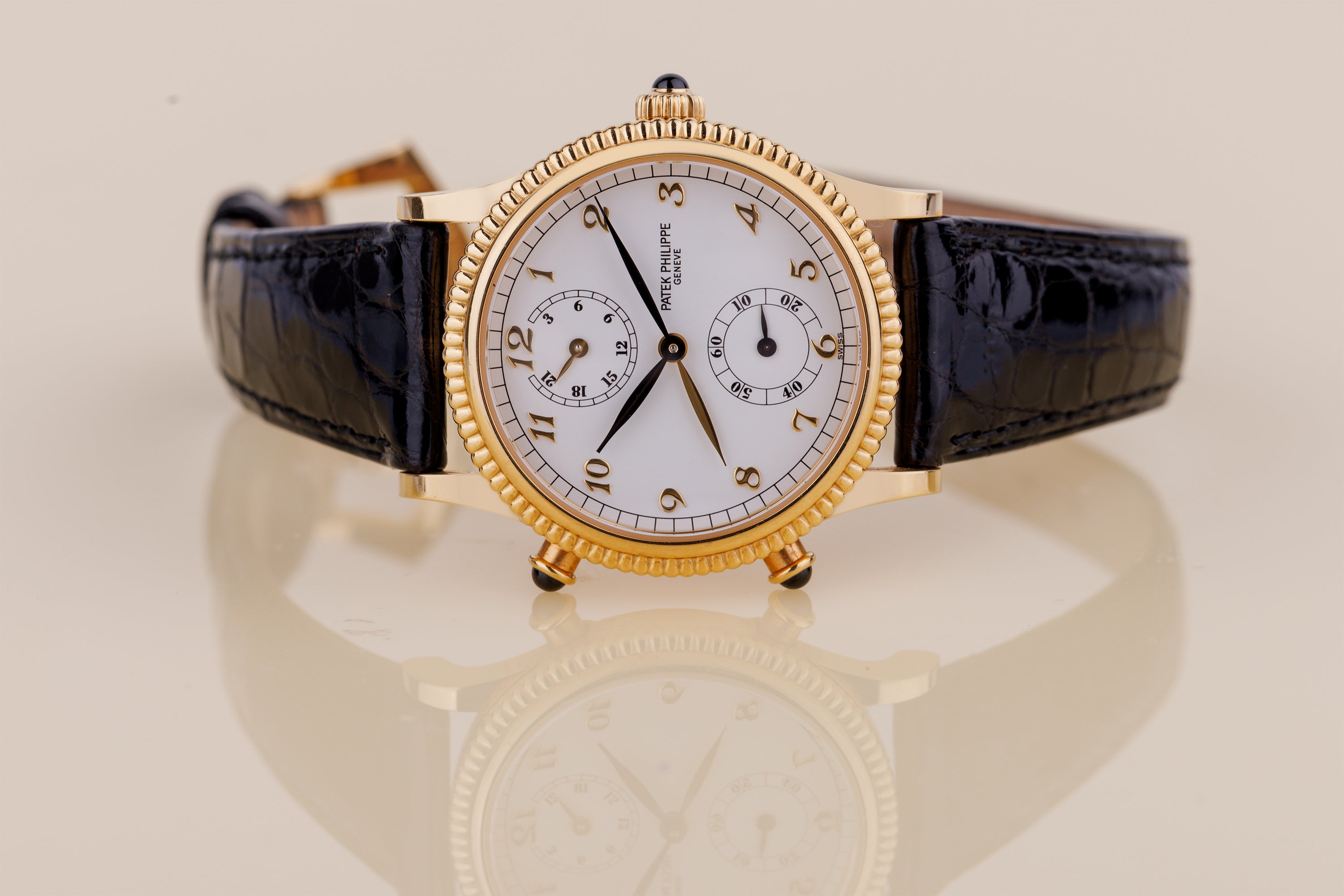 Patek Philippe Calatrava Travel Time | REF. 4864 | 18k Yellow Gold | White Dial | 29mm | Manual Wind | 1990s
