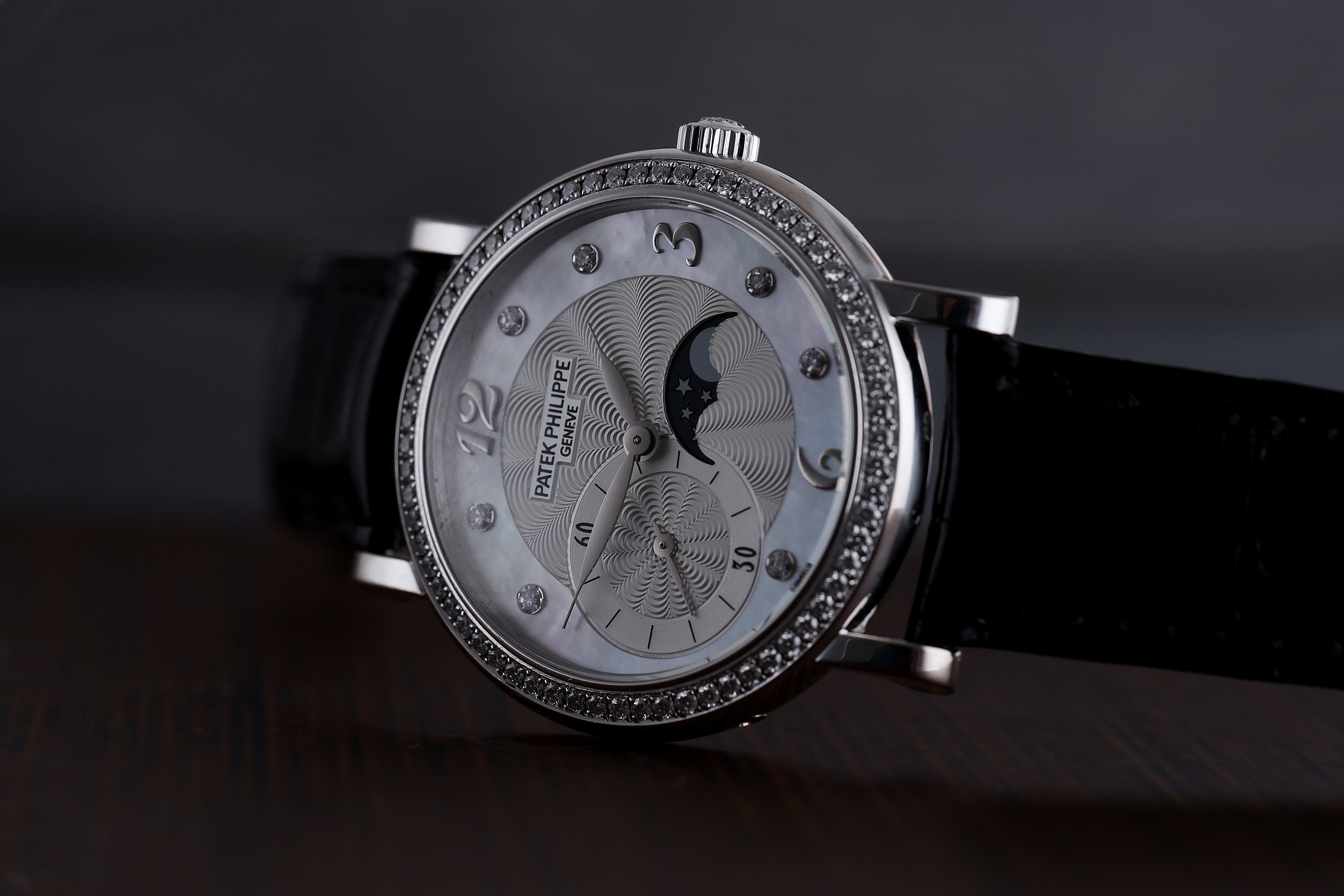 Patek Philippe Ladies Complications Moonphase | REF. 4958G | Diamond Hours & Bezel | Mother of Pearl Dial | 31mm | 18k White Gold | 2010's