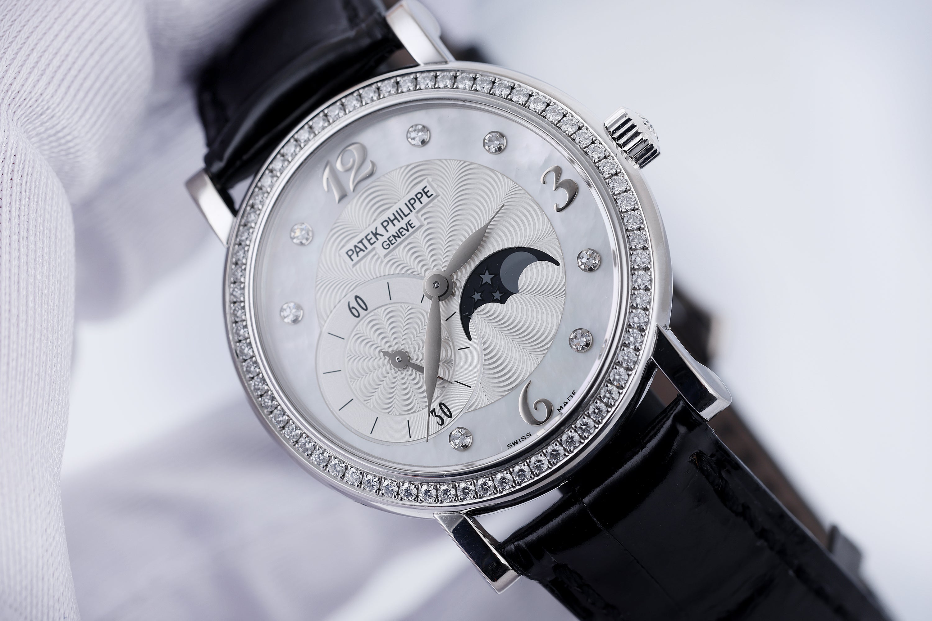 Patek Philippe Ladies Complications Moonphase | REF. 4958G | Diamond Hours & Bezel | Mother of Pearl Dial | 31mm | 18k White Gold | 2010's