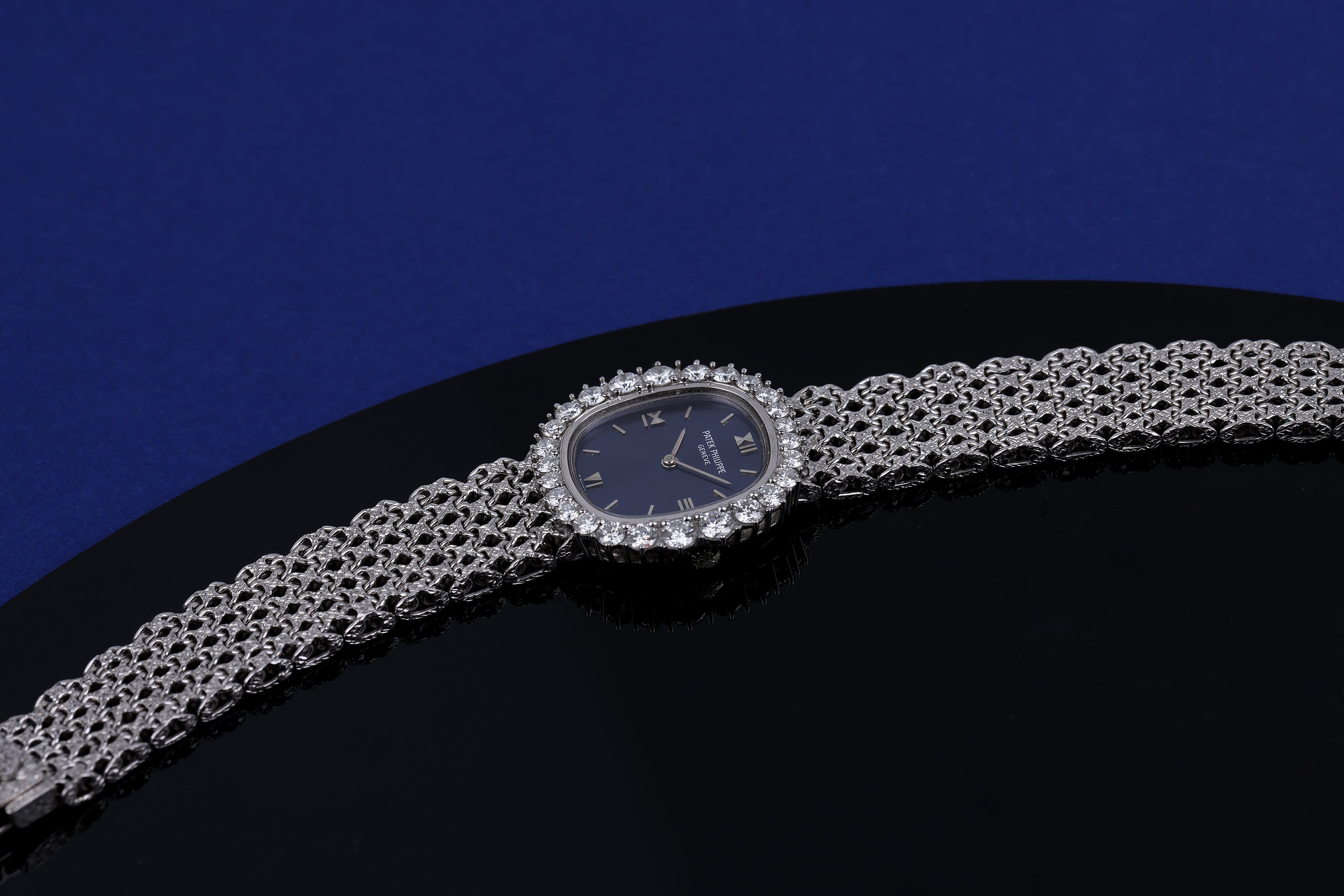 Patek Philippe Lady Ellipse | REF. 4137-1 | Blue Dial | Diamond Bezel | 18k White Gold | Woven Bracelet | Circa 1990's