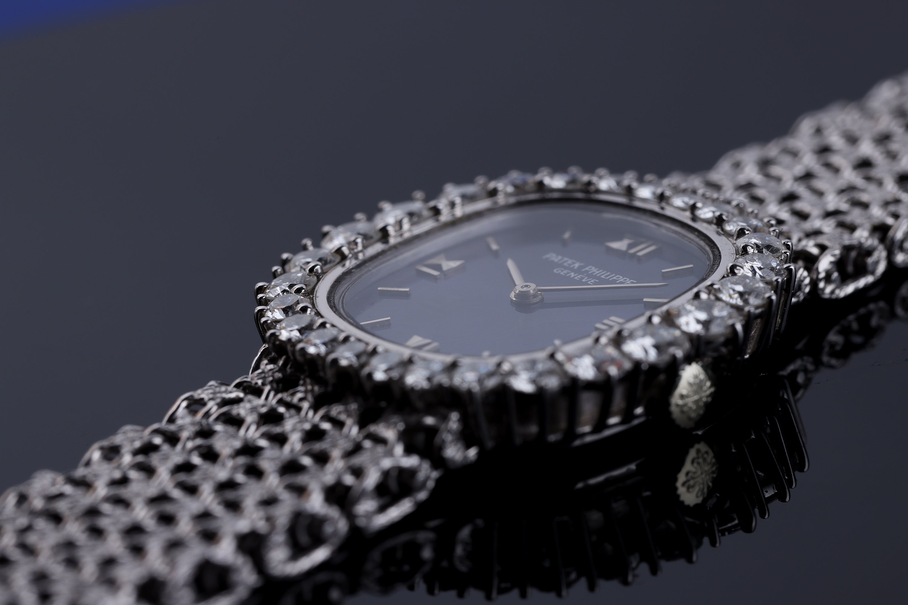 Patek Philippe Lady Ellipse | REF. 4137-1 | Blue Dial | Diamond Bezel | 18k White Gold | Woven Bracelet | Circa 1990's