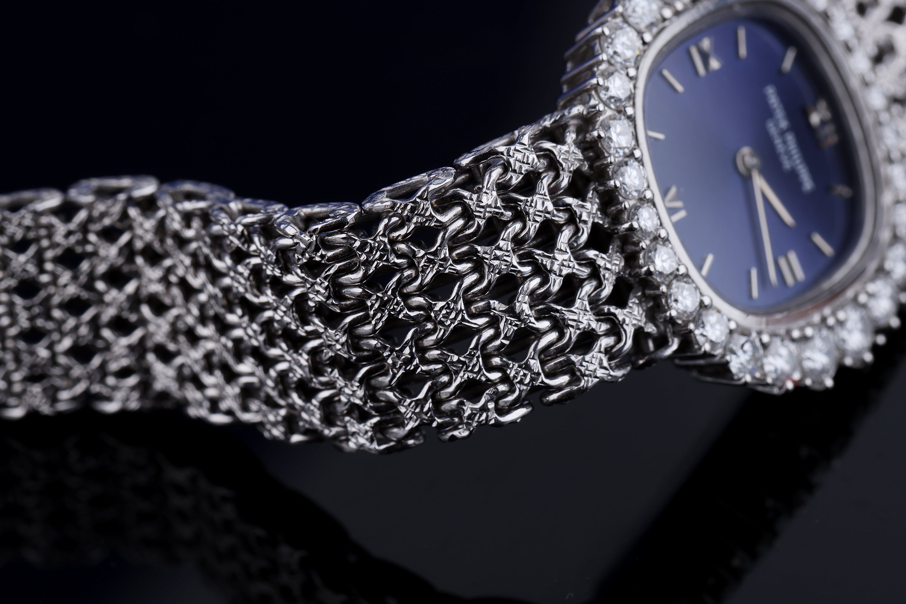 Patek Philippe Lady Ellipse | REF. 4137-1 | Blue Dial | Diamond Bezel | 18k White Gold | Woven Bracelet | Circa 1990's