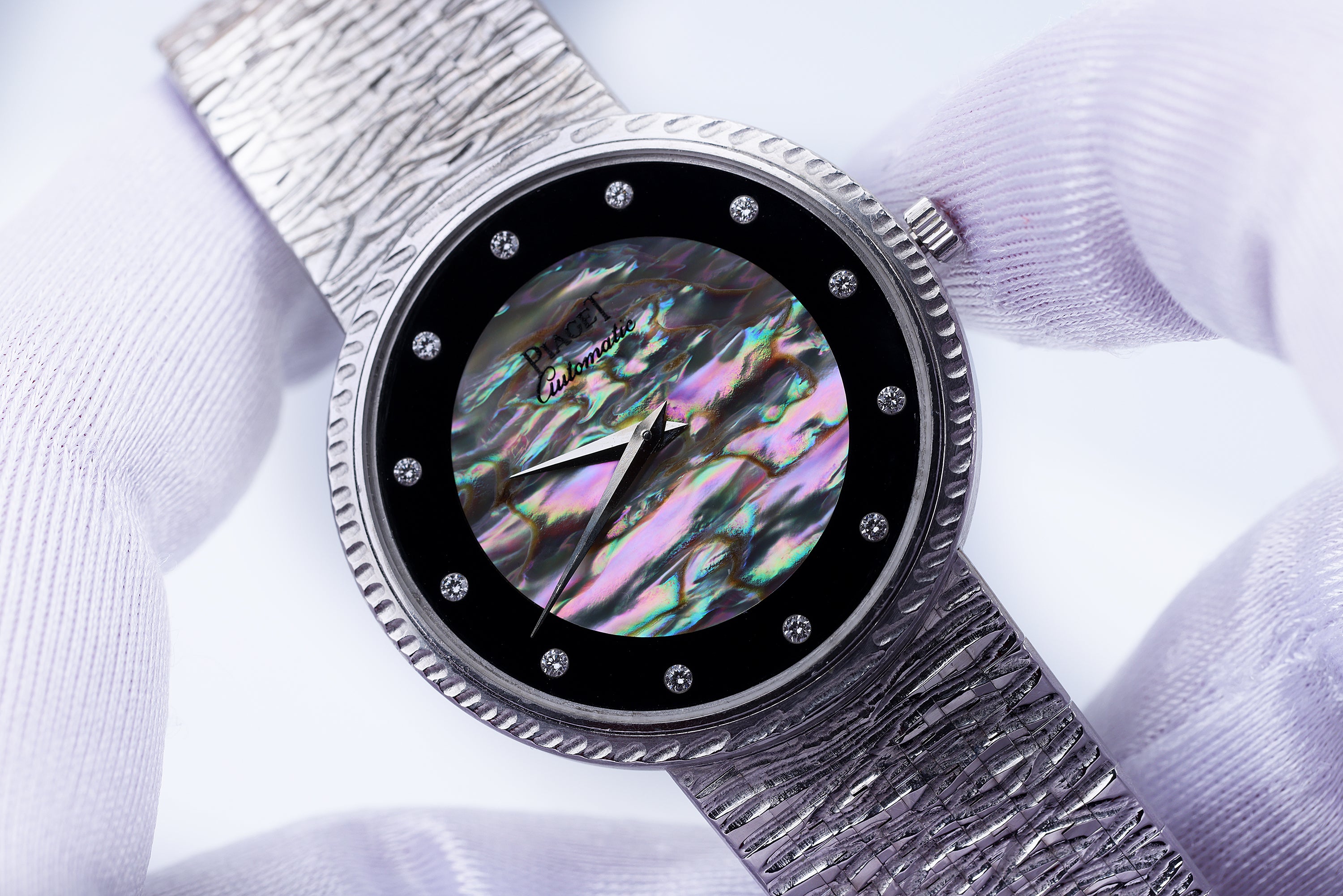 Piaget 1970's wristwatch | REF. 12343 A 19 | Onyx & White Mother of Pearl Diamond Dial | 34mm | 18k White Gold | Automatic | Box