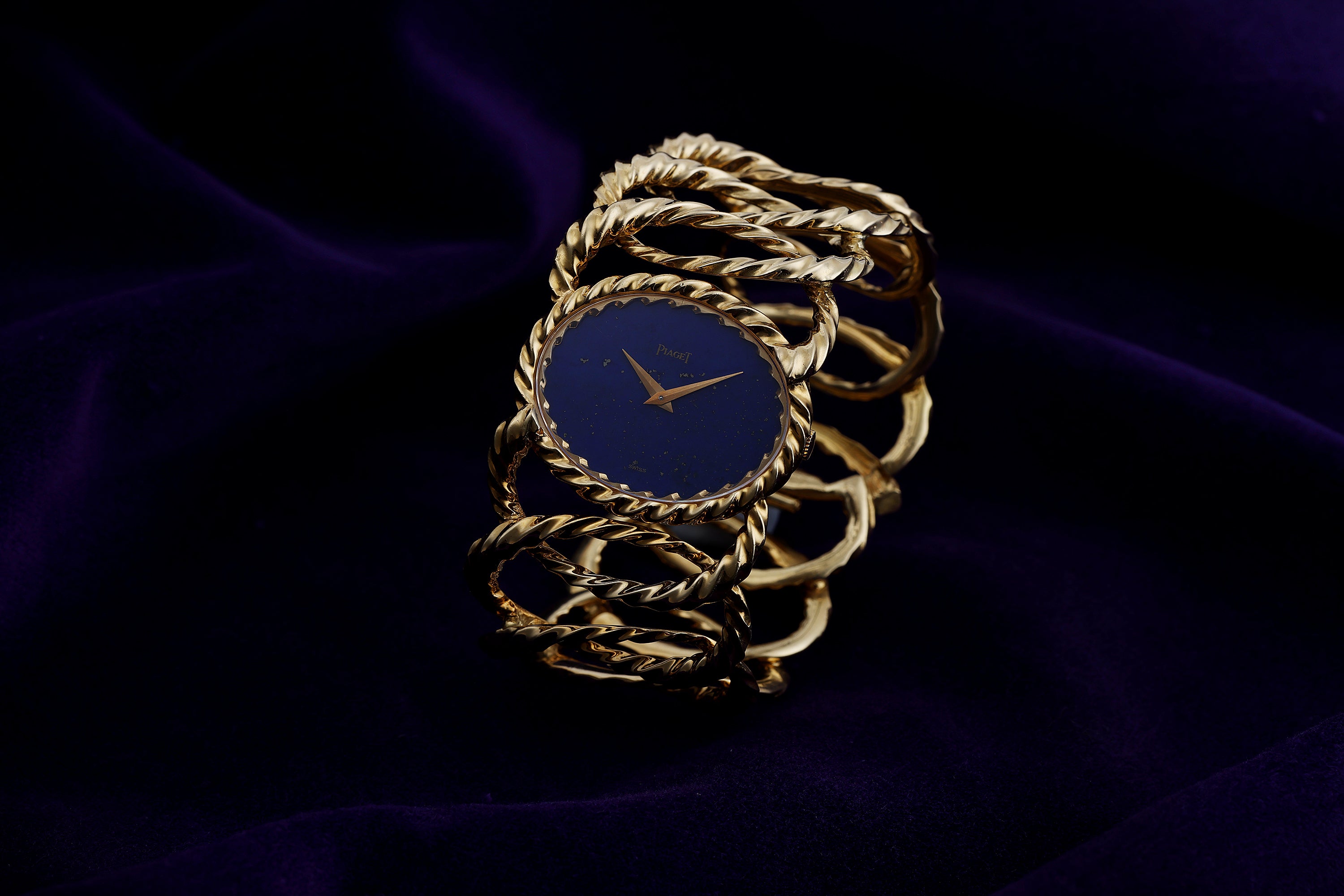 Piaget 'Esclave' Cuff Watch | REF. 9855 D 35 | Lapis Lazuli Dial | 18k Yellow Gold | 32mm | 1970s