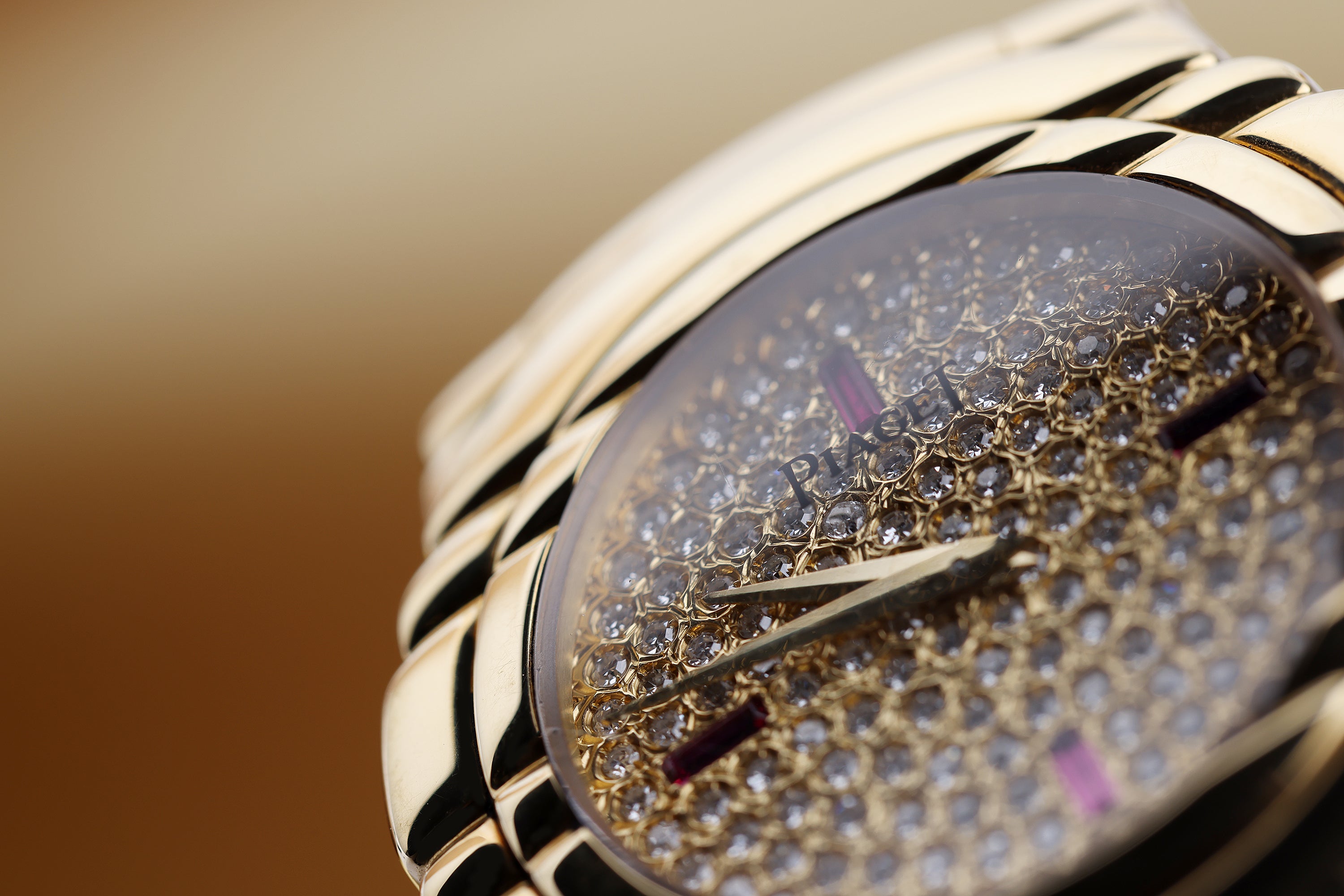 Piaget Tanagra | REF. GOA 15246 | Pavé Diamond & Ruby Baguette Dial | 18k Yellow Gold | 33mm | Circa 1990's