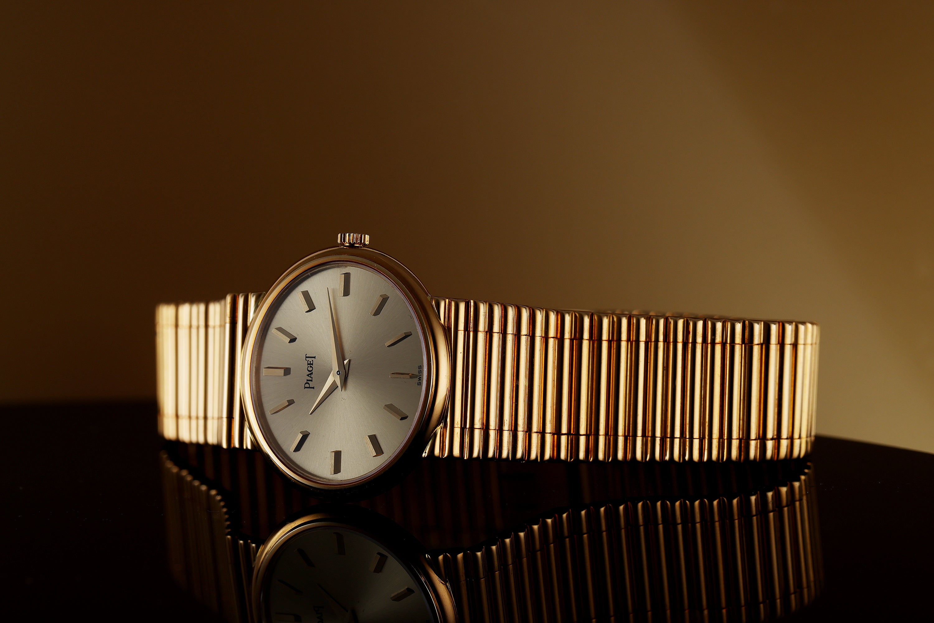 Unworn Piaget Vintage Wristwatch | REF. 9802 G 1 | Gold Dial - 3D Numerals | 27mm | 18k Yellow Gold | Manual Wind | 1981