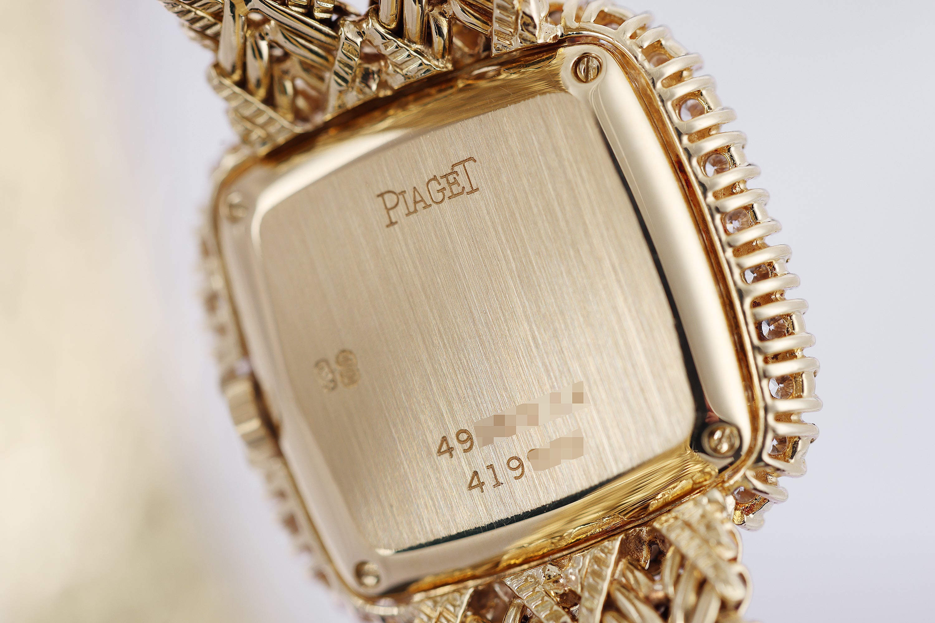 Piaget 1990s Ladies Wristwatch | REF. 4906 D 14 | Diamond Bezel | 23mm | Manual Wind | 18k Yellow Gold