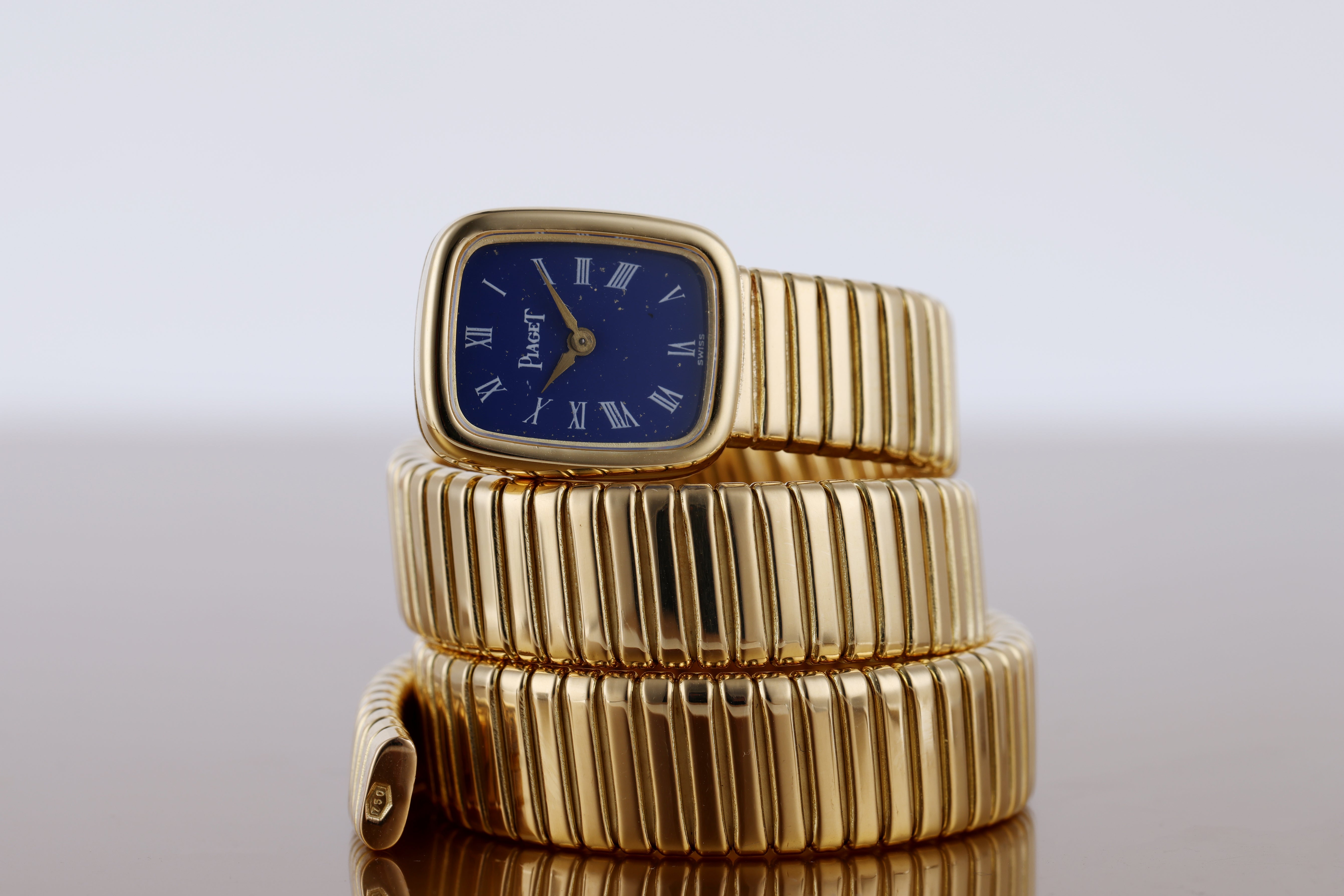 Piaget Serpenti Tubogas Wristwatch | Circa 1960's | Blue Dial | 18k Yellow Gold