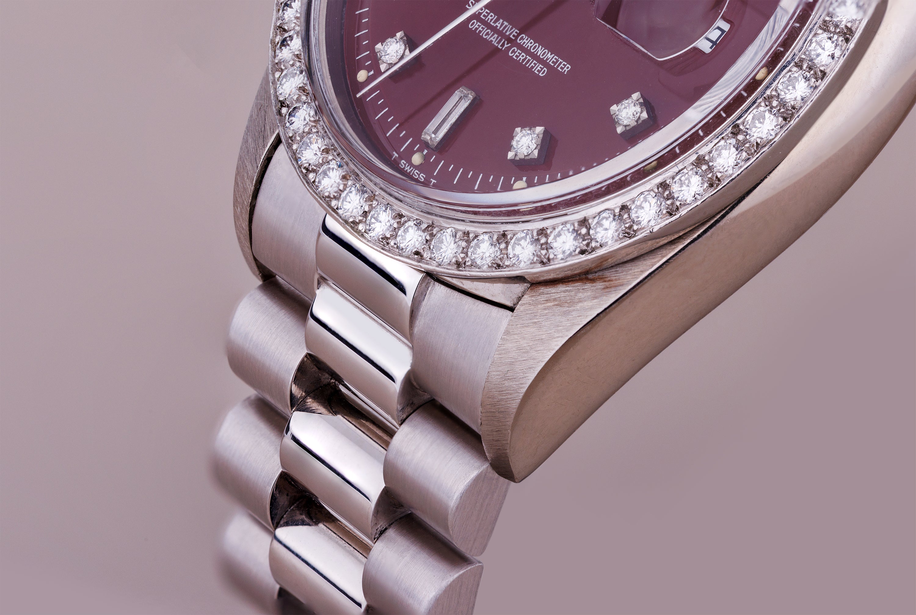 Ultra-Rare Left-Handed Rolex Day-Date | REF. 1804 | Oxblood Red 'Stella' Dial | Diamond Hours & Bezel | 18k White Gold | 1978