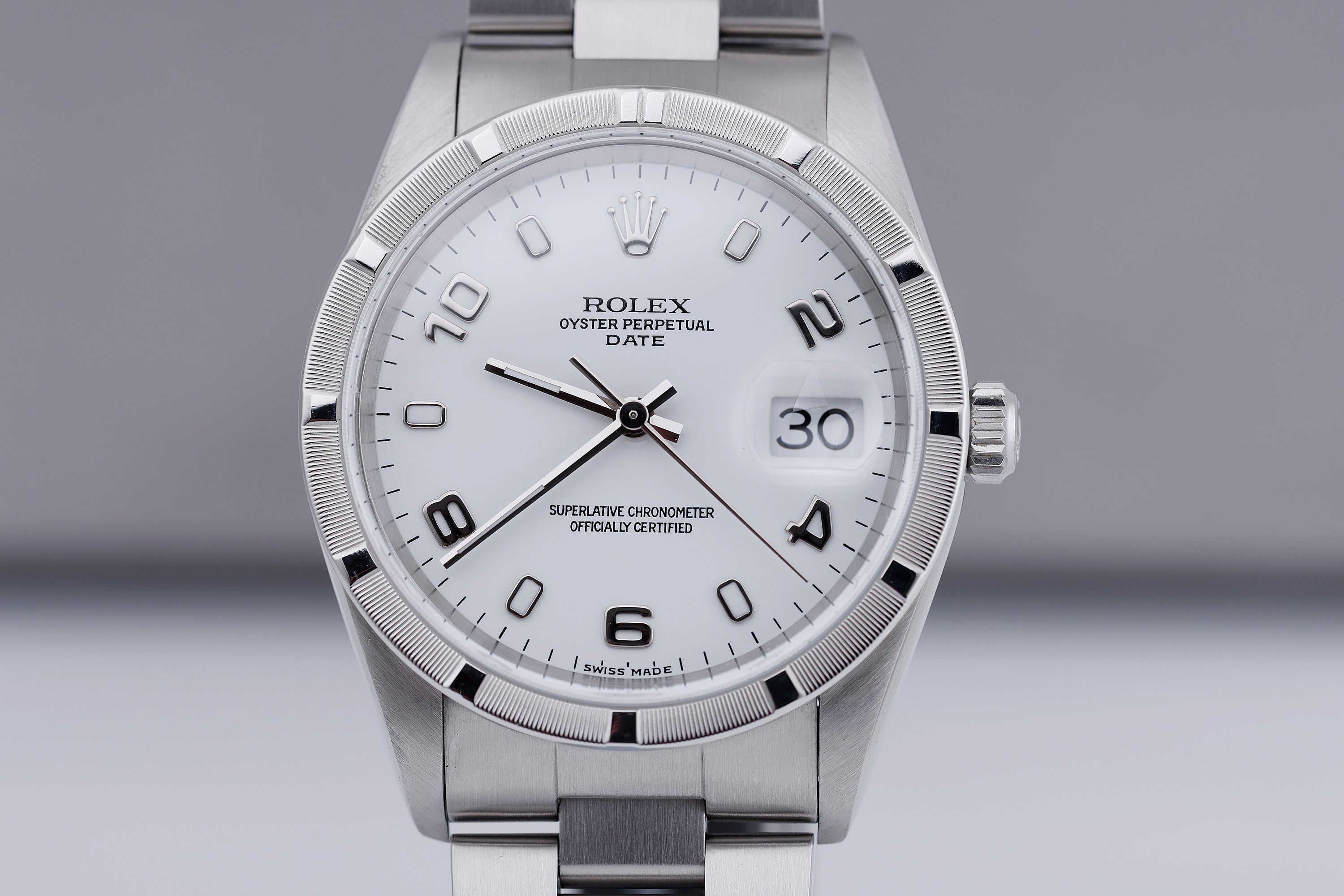 Rolex Date 34mm | REF. 15210 | White Dial | Engine Turned Bezel | Stainless Steel | 2001