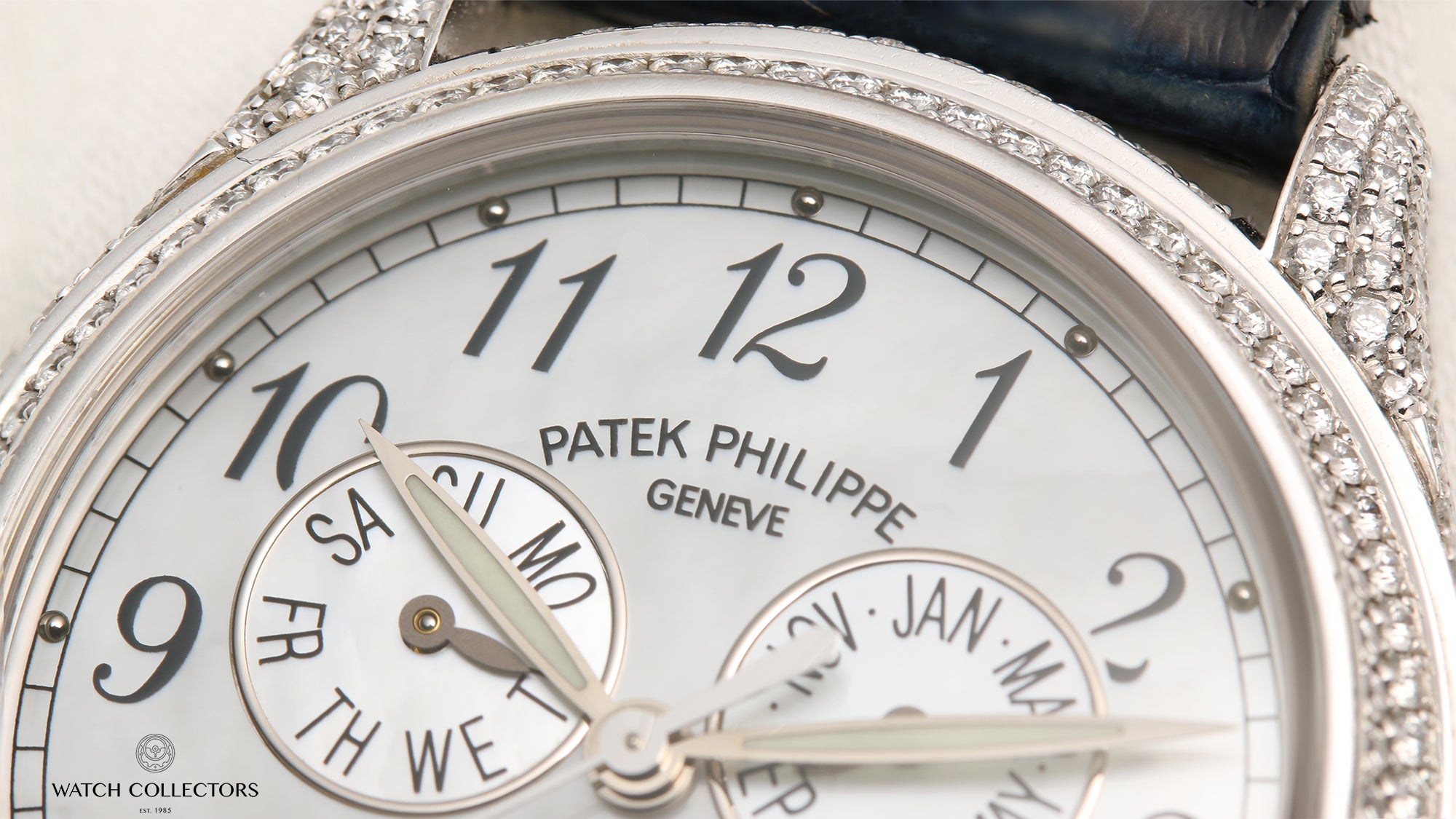 Patek Philippe Nautilus 4937G-001 18K Rose & White Gold Second Hand Watch Collectors 3