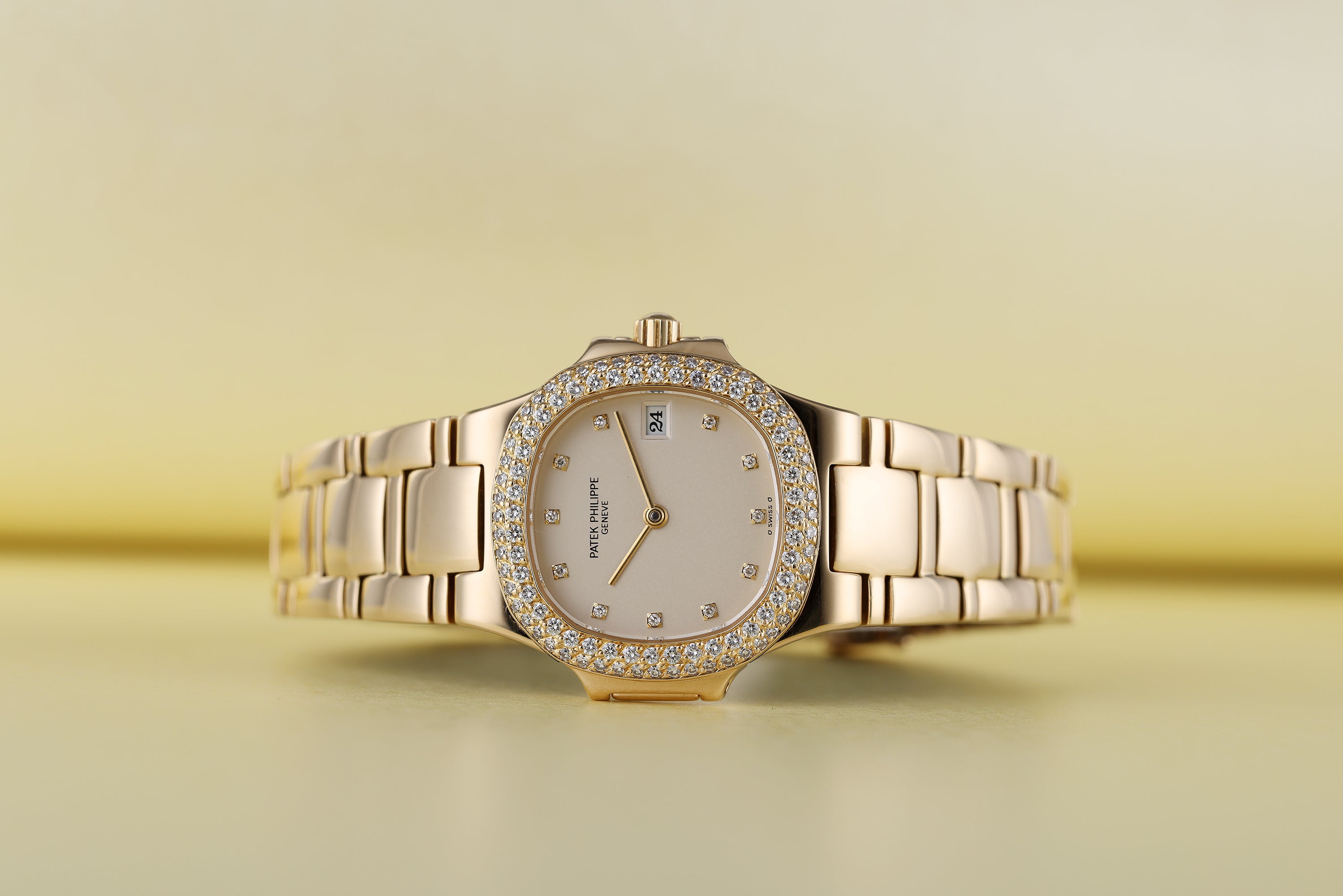 Patek Philippe Lady Nautilus | REF. 4700/54 | Cream Dial | Diamond Hours & Bezel | 18k Yellow Gold