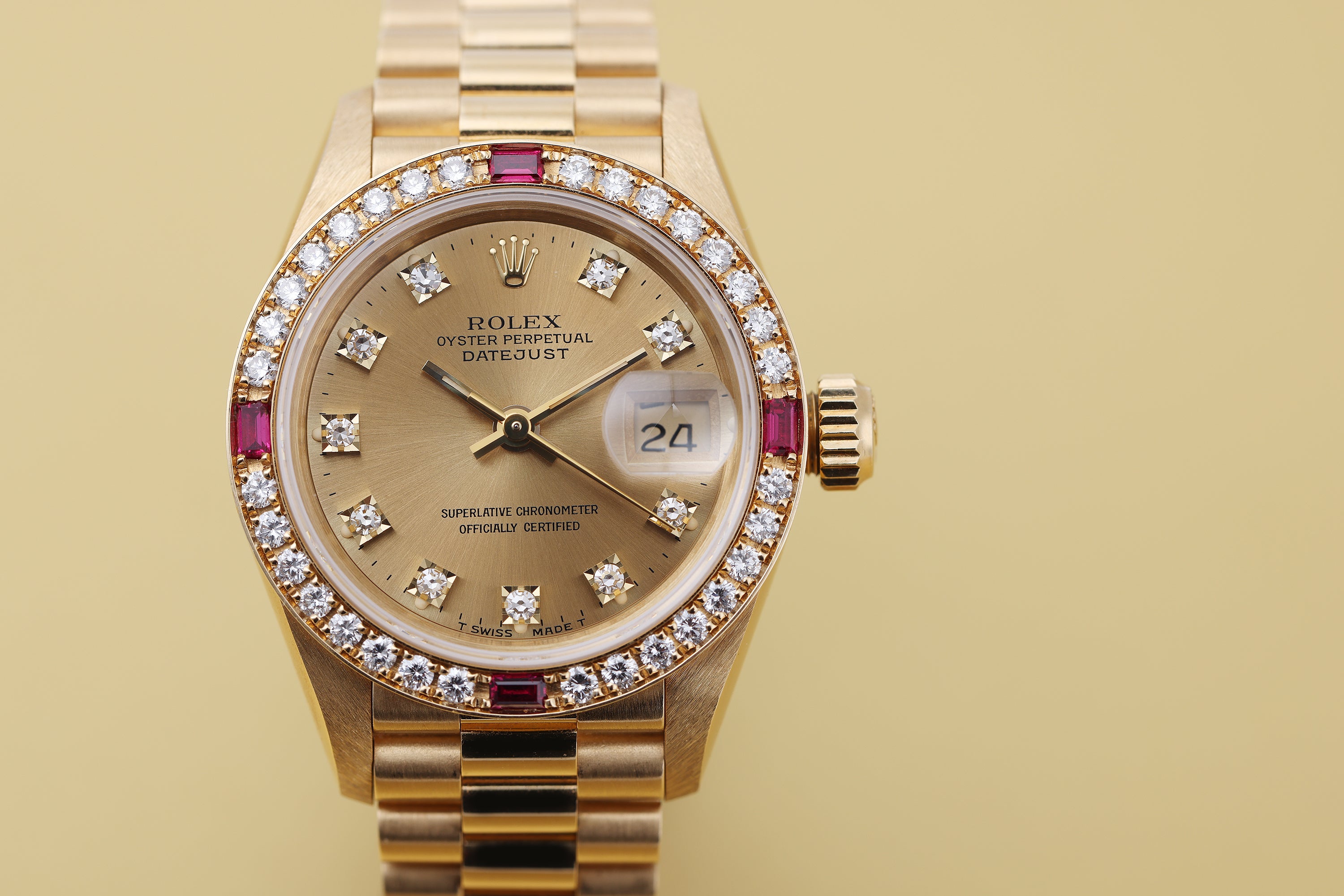 NOS: Rolex Lady DateJust | Diamond & Ruby Dial Bezel | 18k Yellow Gold | 69068 | Unpolished