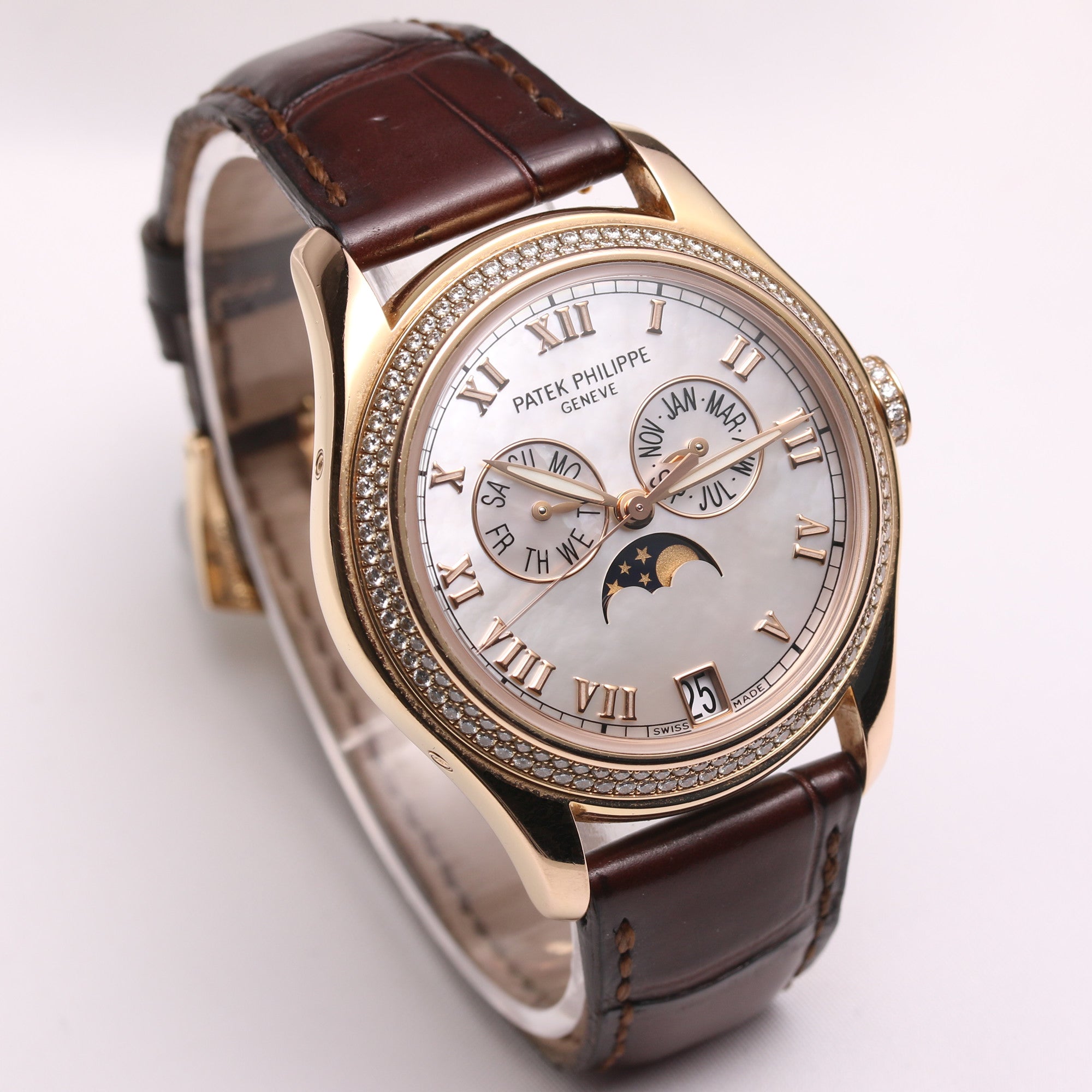 patek_philippe_annual_calendar_4936r_18k_rose_gold_diamonds_second_hand_watch_collectors_2_.jpg