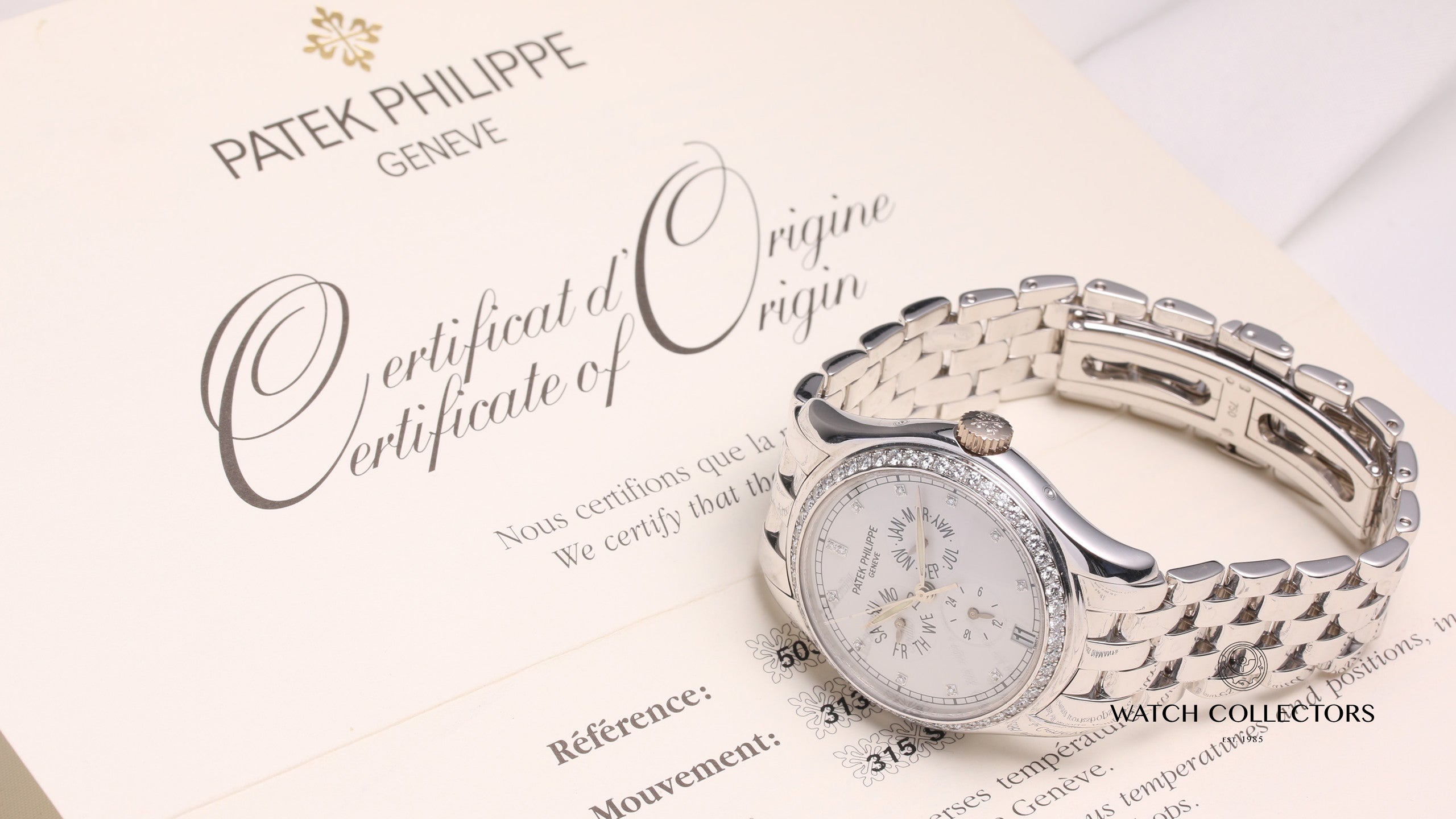 patek_philippe_annual_calendar_50371g-001_18k_white_gold_diamond_second_hand_watch_collectors_10_