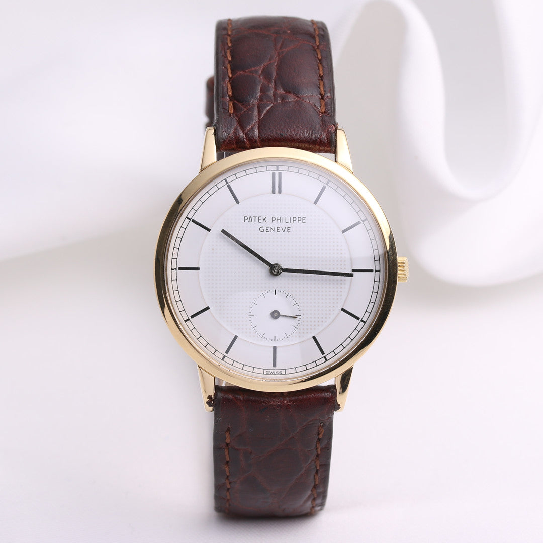 patek_philippe_calatrava_18k_yellow_gold_second_hand_watch_collectors_1_.jpg
