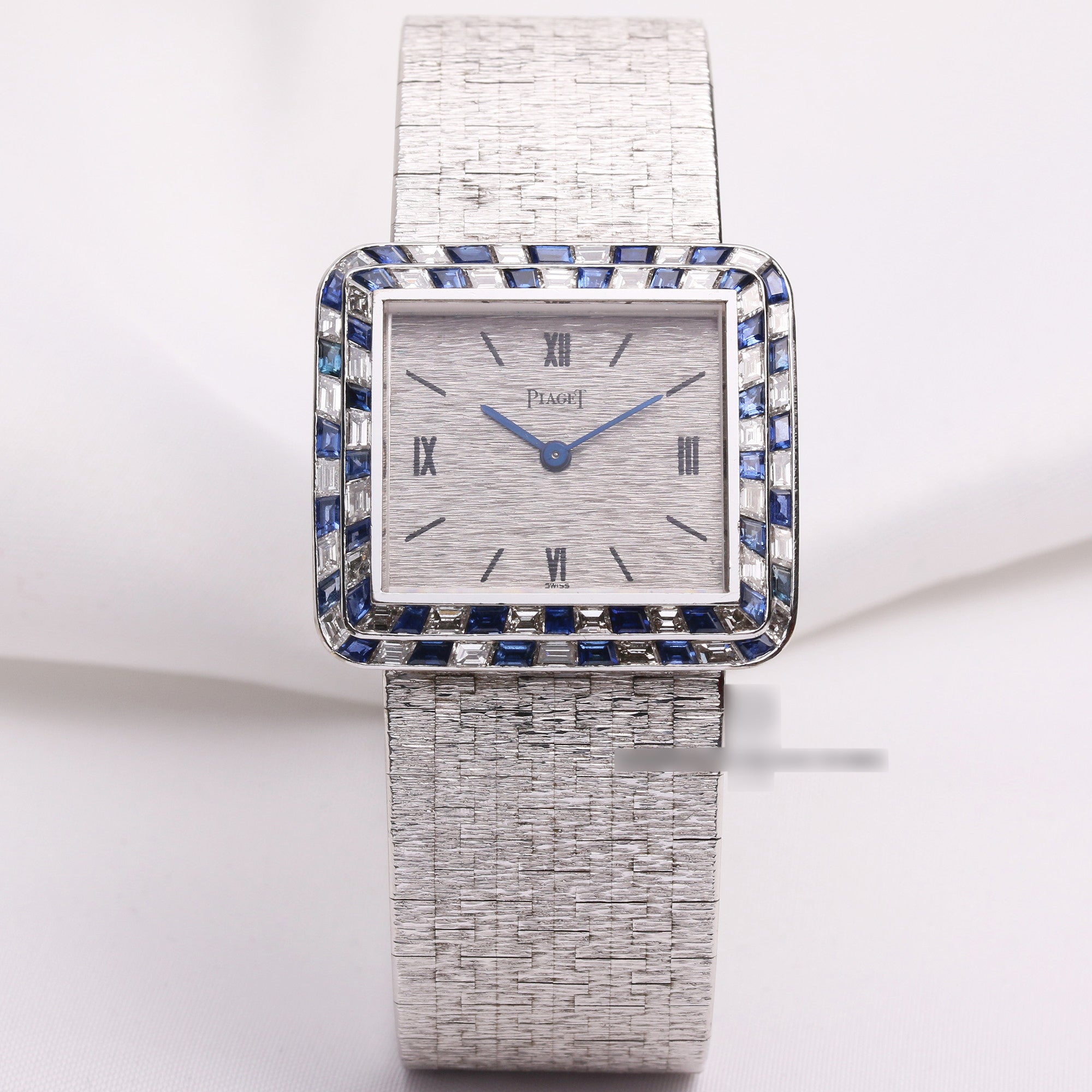 piaget_18k_white_gold_diamond_sapphire_bezel_9366a6_second_hand_watch_collectors_1-1