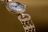 Breguet Ladies Wristwatch Circa 1990's | Silver Dial | Baguette Diamonds | 18k Yellow Gold | Diamond Bezel, Shoulders & Bracelet