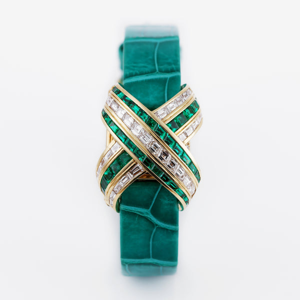 Audemars Piguet Ladies Wristwatch | REF. 67057/BA/E/0132 / 01 | Pave Diamond Dial, Emerald Hours | Emerald & Diamond 'X' Case | 18k Yellow Gold | Circa 1990's