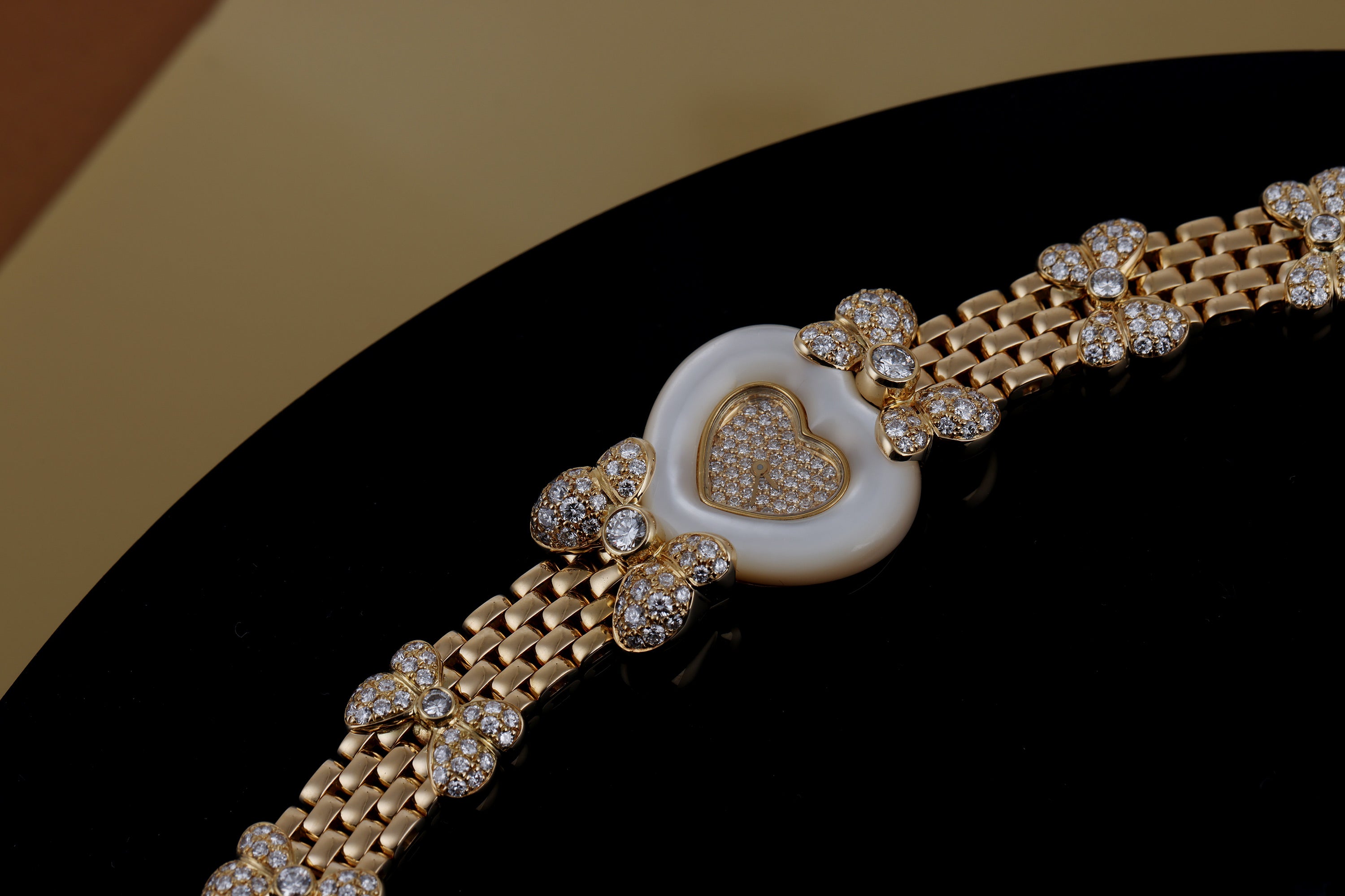 Chopard Ladies Watch | Heart-Shaped Mother of Pearl Bezel | REF. 538 1 | Pave Diamond Dial & Bow Bracelet | 18k Yellow Gold | 25mm | 1990's