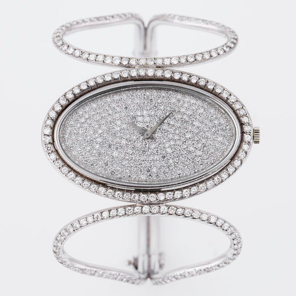 Montre Royale Bracelet Bangle Watch | Pave Diamond Dial | Diamond Bezel & Bangle | Oval Case | 18k White Gold | 48mm | 1970's