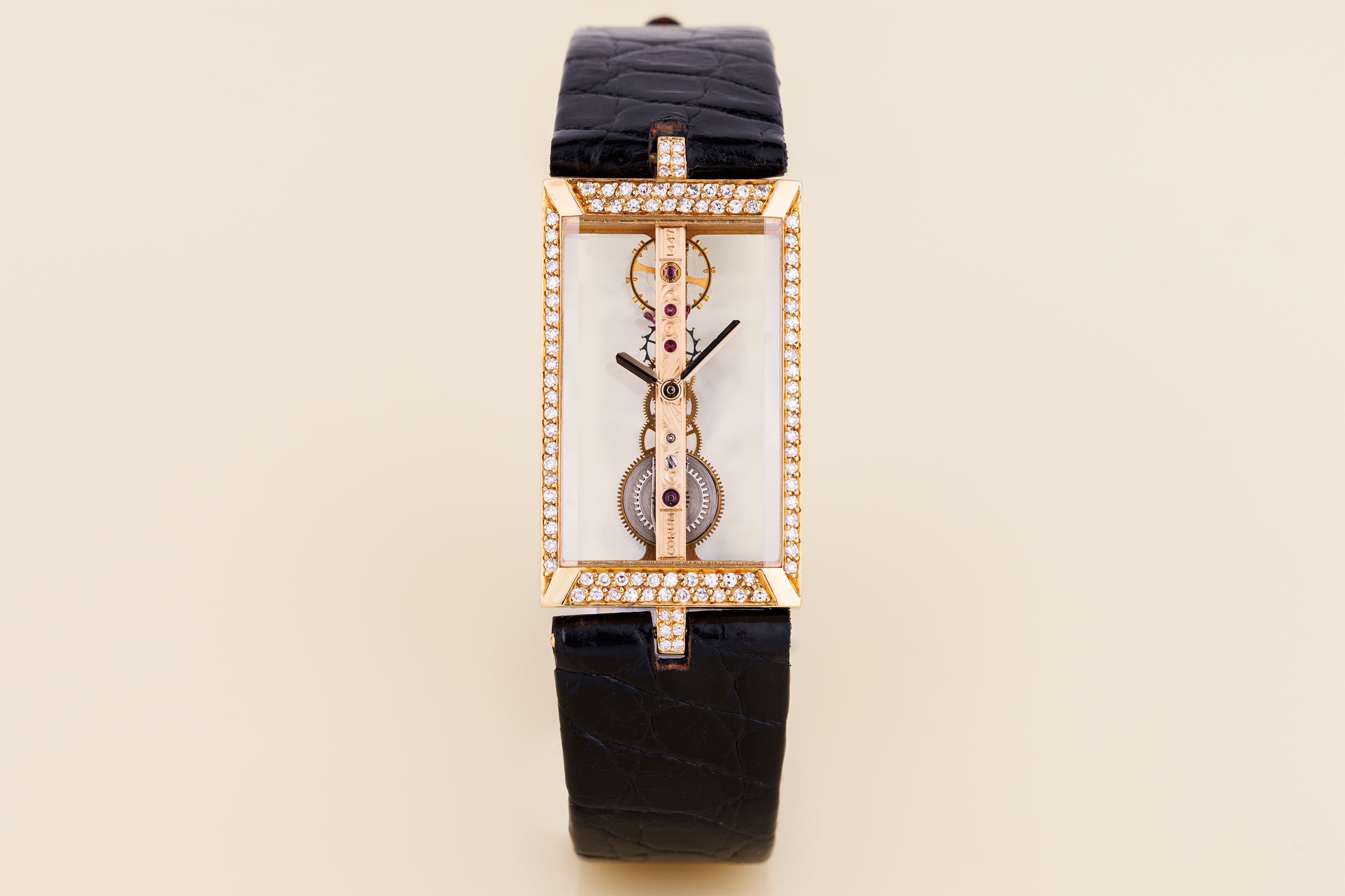 Corum Golden Bridge | REF. 13.206 | Skeletonised Dial | Diamond Bezel | 18k Yellow Gold | 20mm | Manual Wind | 1990's