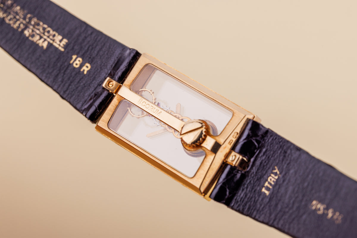 Corum Golden Bridge | REF. 13.206 | Skeletonised Dial | Diamond Bezel | 18k Yellow Gold | 20mm | Manual Wind | 1990's